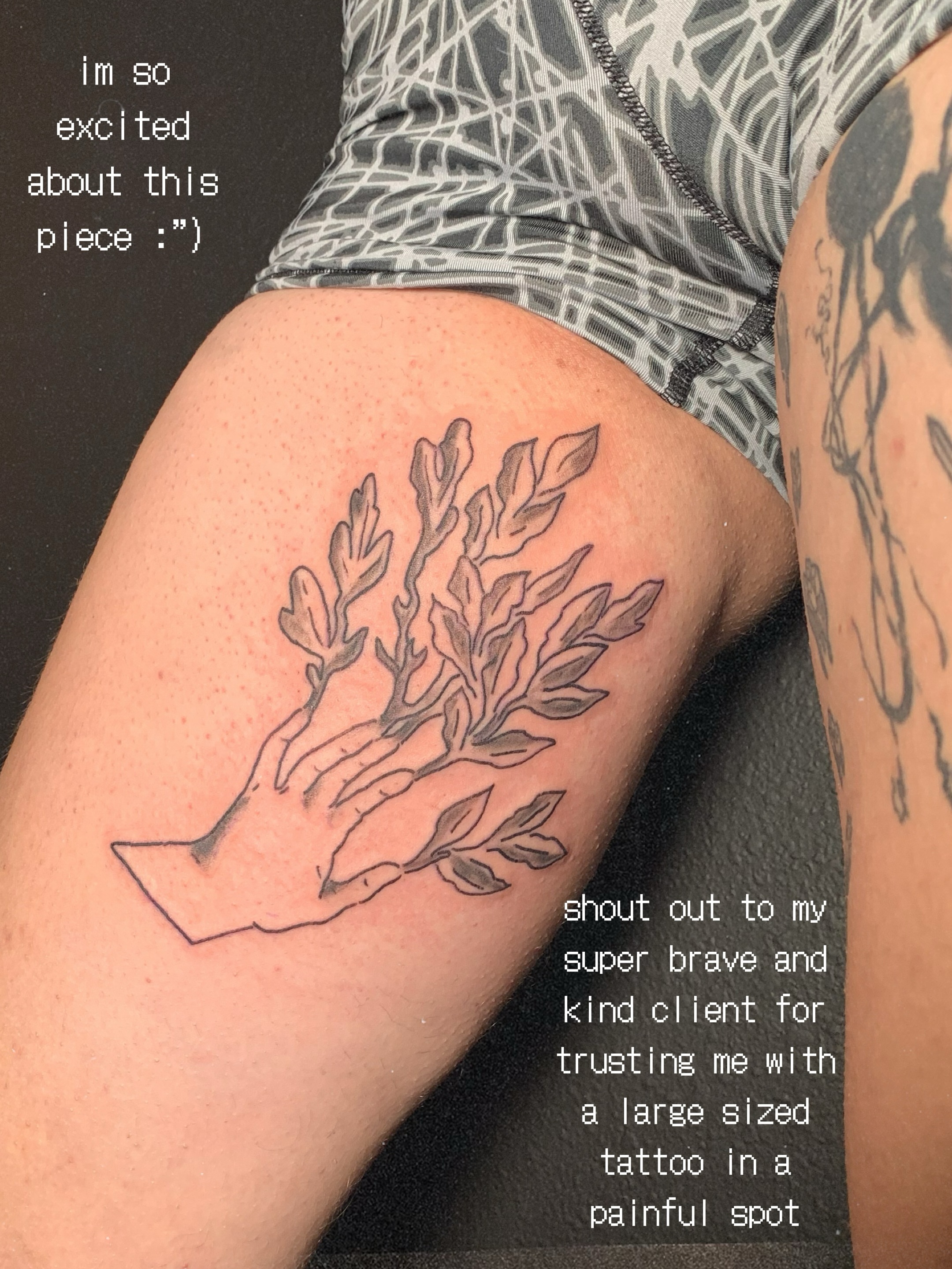 Branch with leaves black and grey tattoo on the thigh by charles
