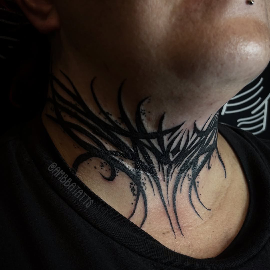 Abstract design black and grey tattoo on the neck by amber brady, Brunswick, Ohio