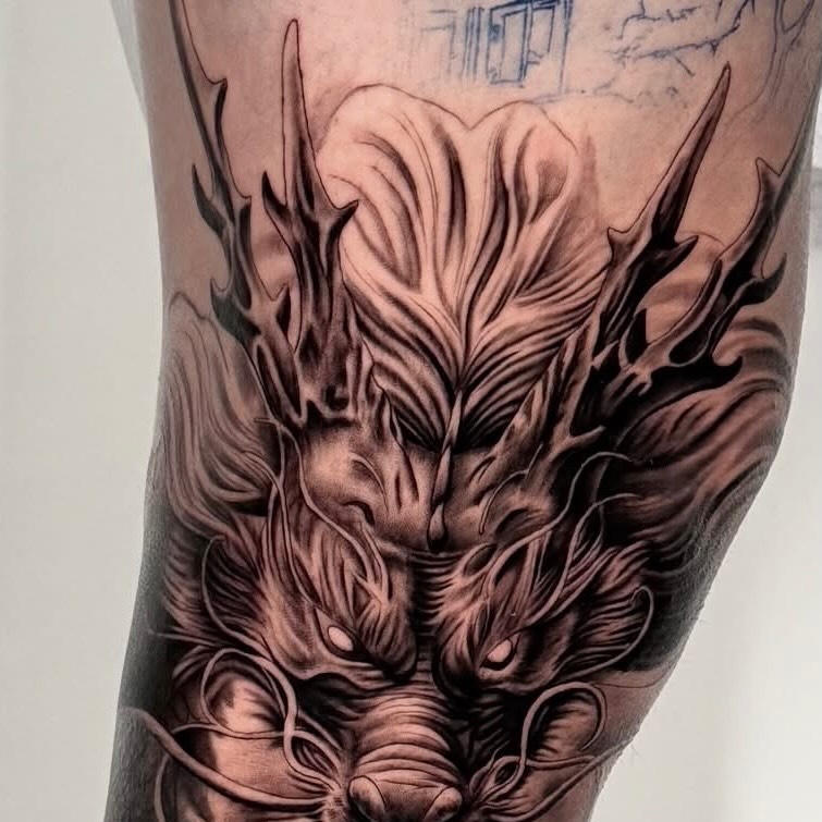 Dragon realism tattoo on the forearm by Elijah Tattoos, San Diego, California