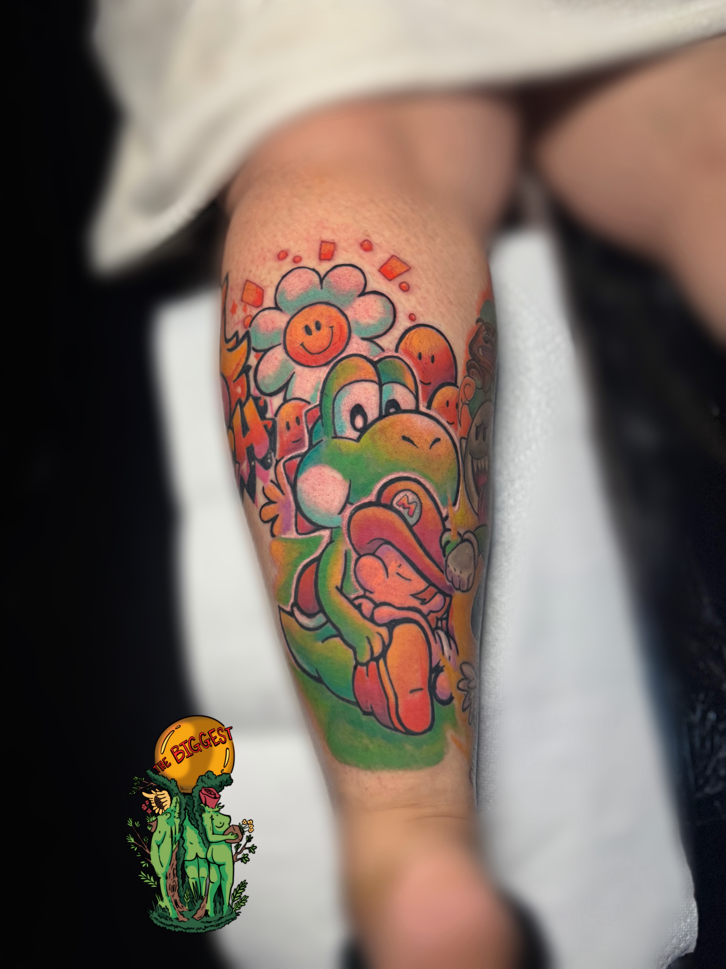 Yoshi and mario new school tattoo on the forearm by Marques Neal