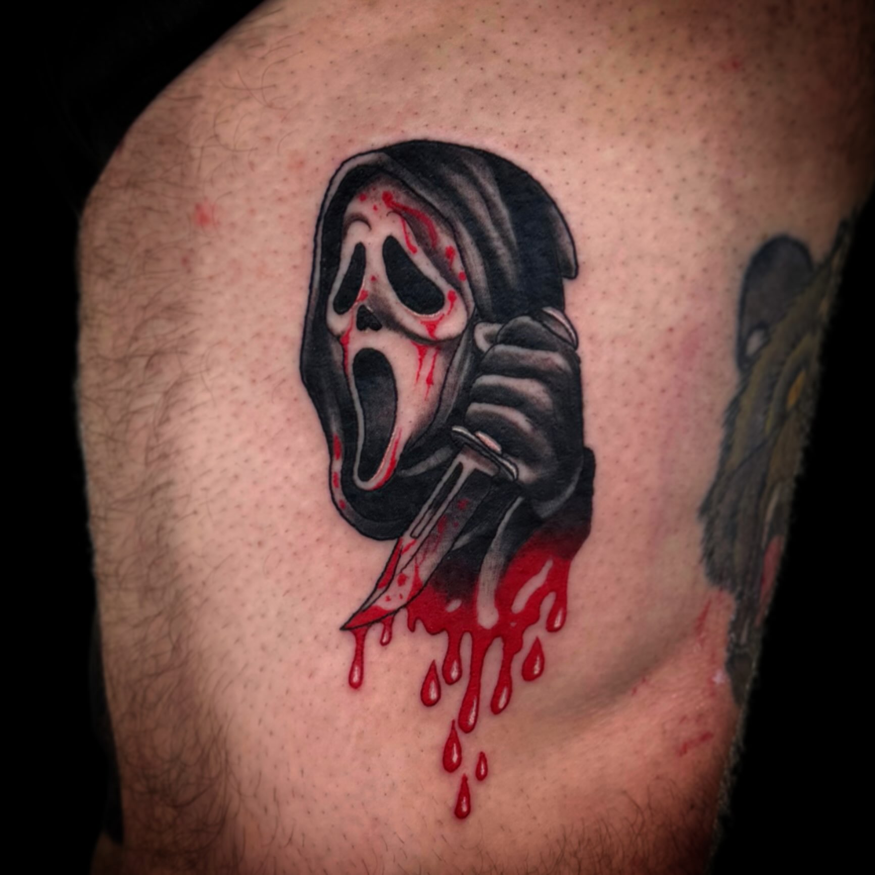 Scream mask dark realism tattoo on the thigh by โงโ โฑ โพ ๐ณ๐๐๐๐๐ โฆ โฑ โโง