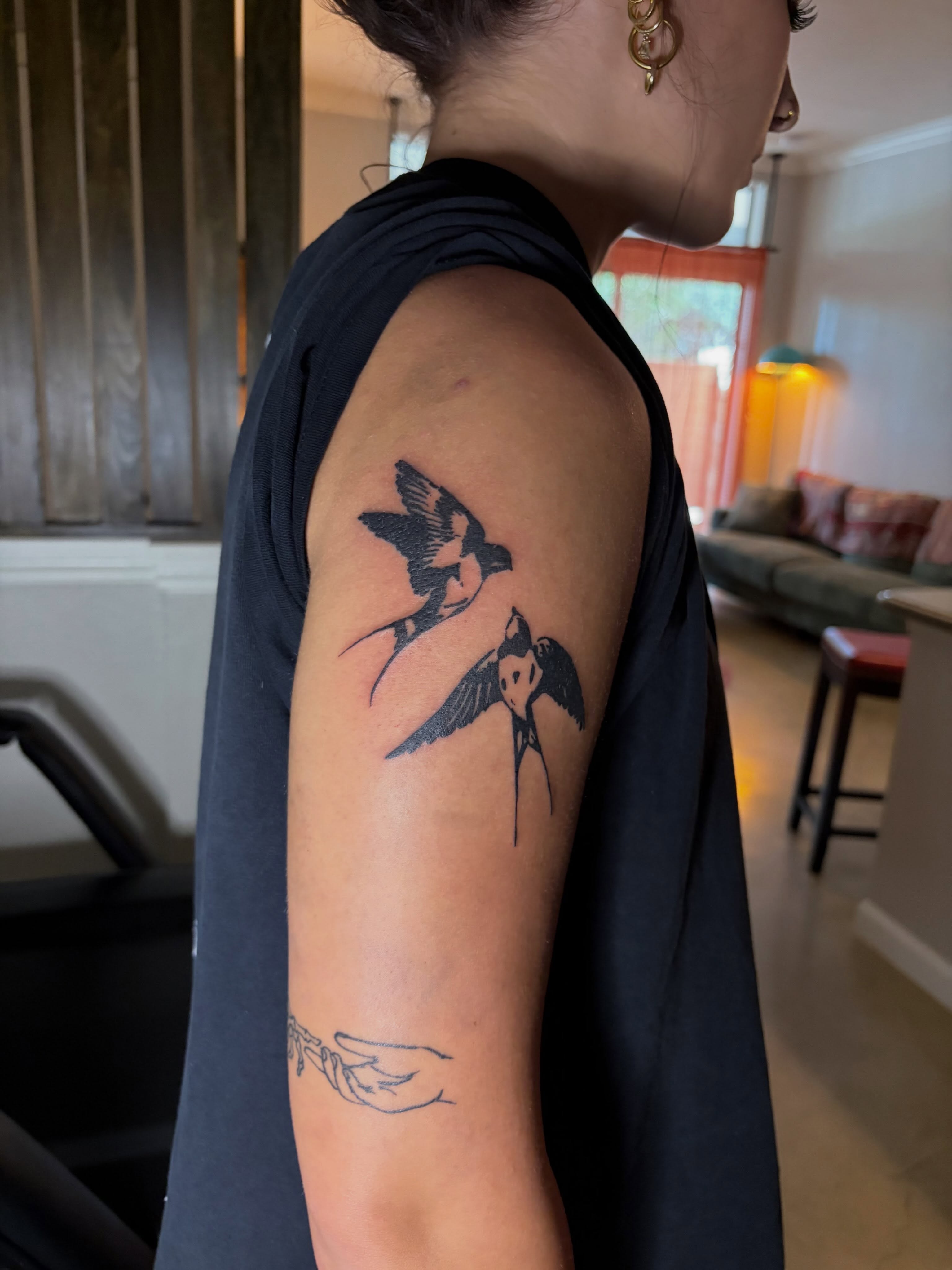 Swallows black and grey tattoo on the forearm by blastedbybk
