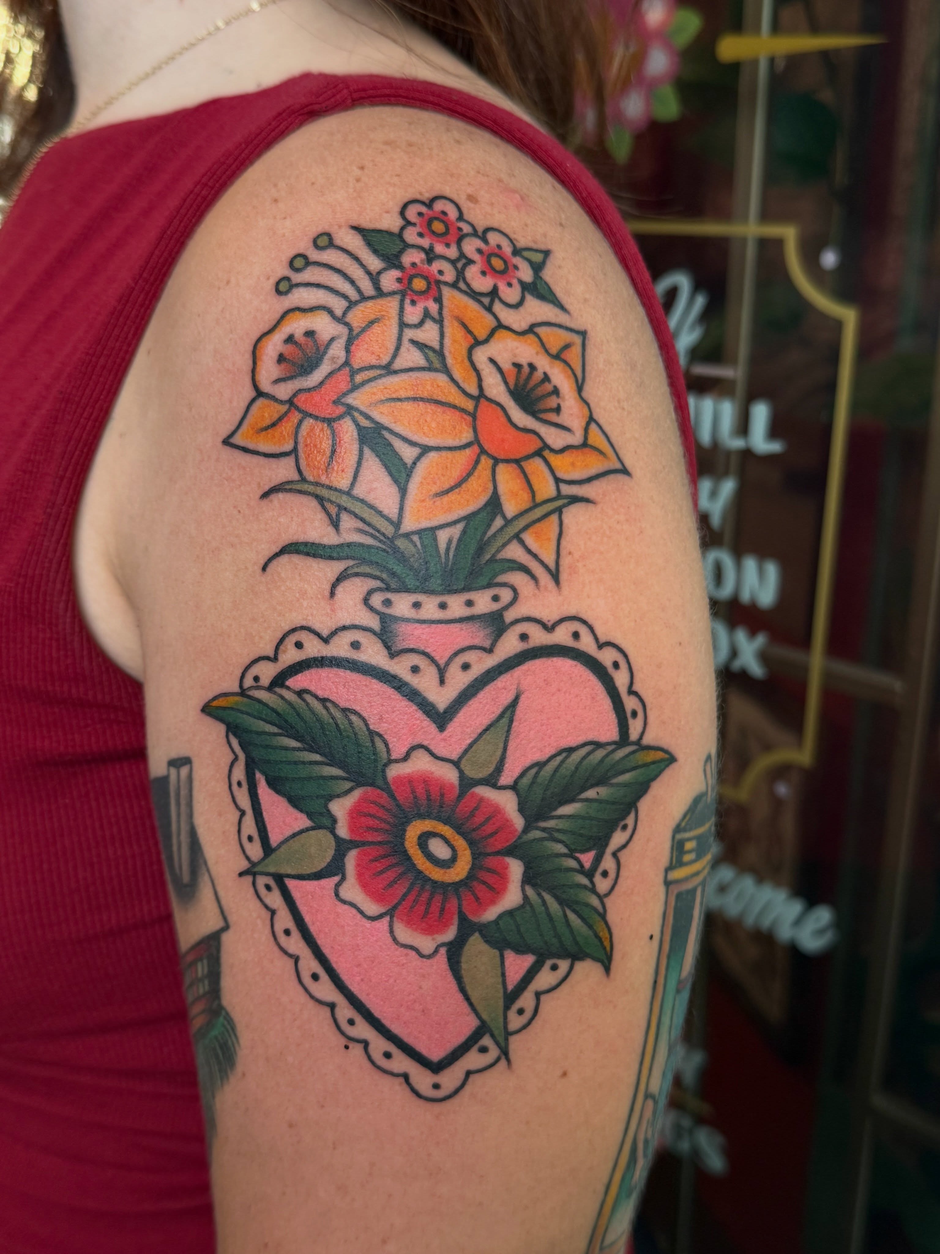 Heart with flowers American traditional tattoo on the shoulder by 🍓miranda joon bradbury🍓