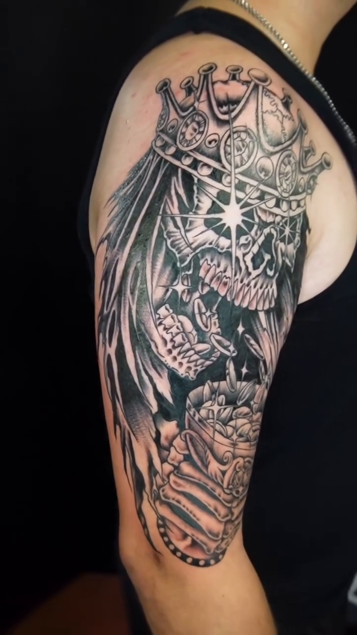 Skull with crown and wings dark realism tattoo by Bobby Tobin