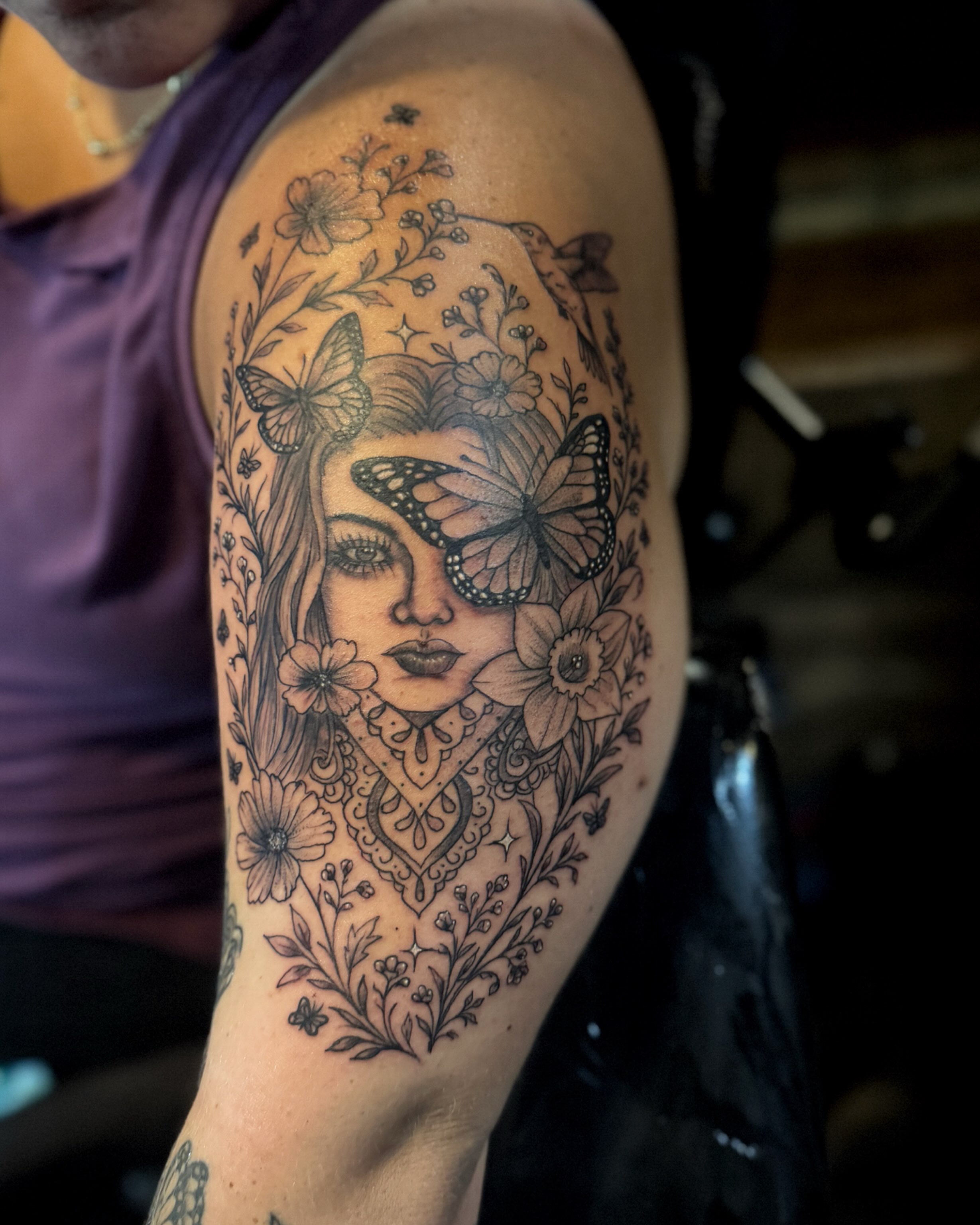 Woman with butterflies ornamental tattoo on the shoulder by Chris Adkins Tattoos, Chattanooga, Tennessee