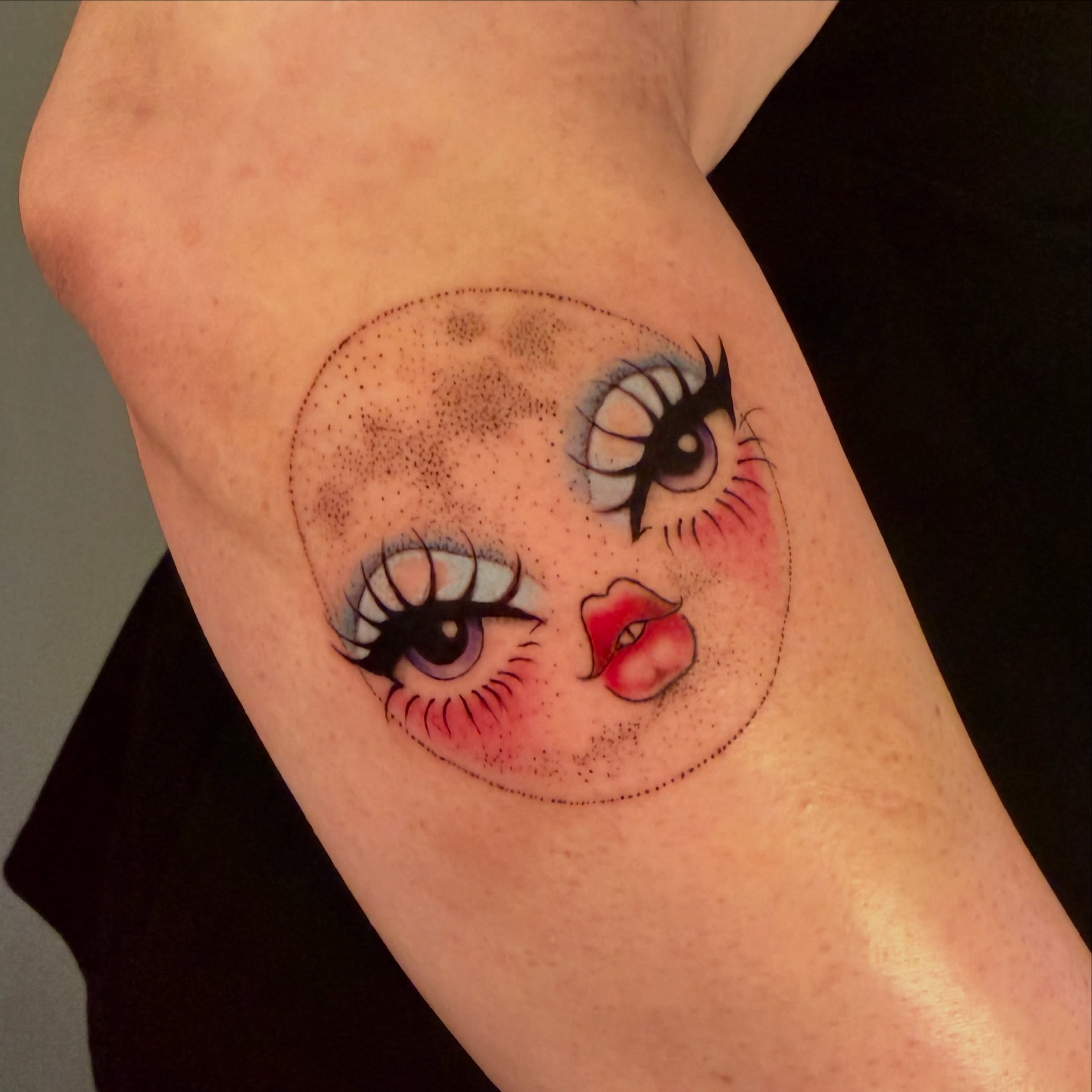 Doll face dotwork tattoo on the forearm by tattooz by megz