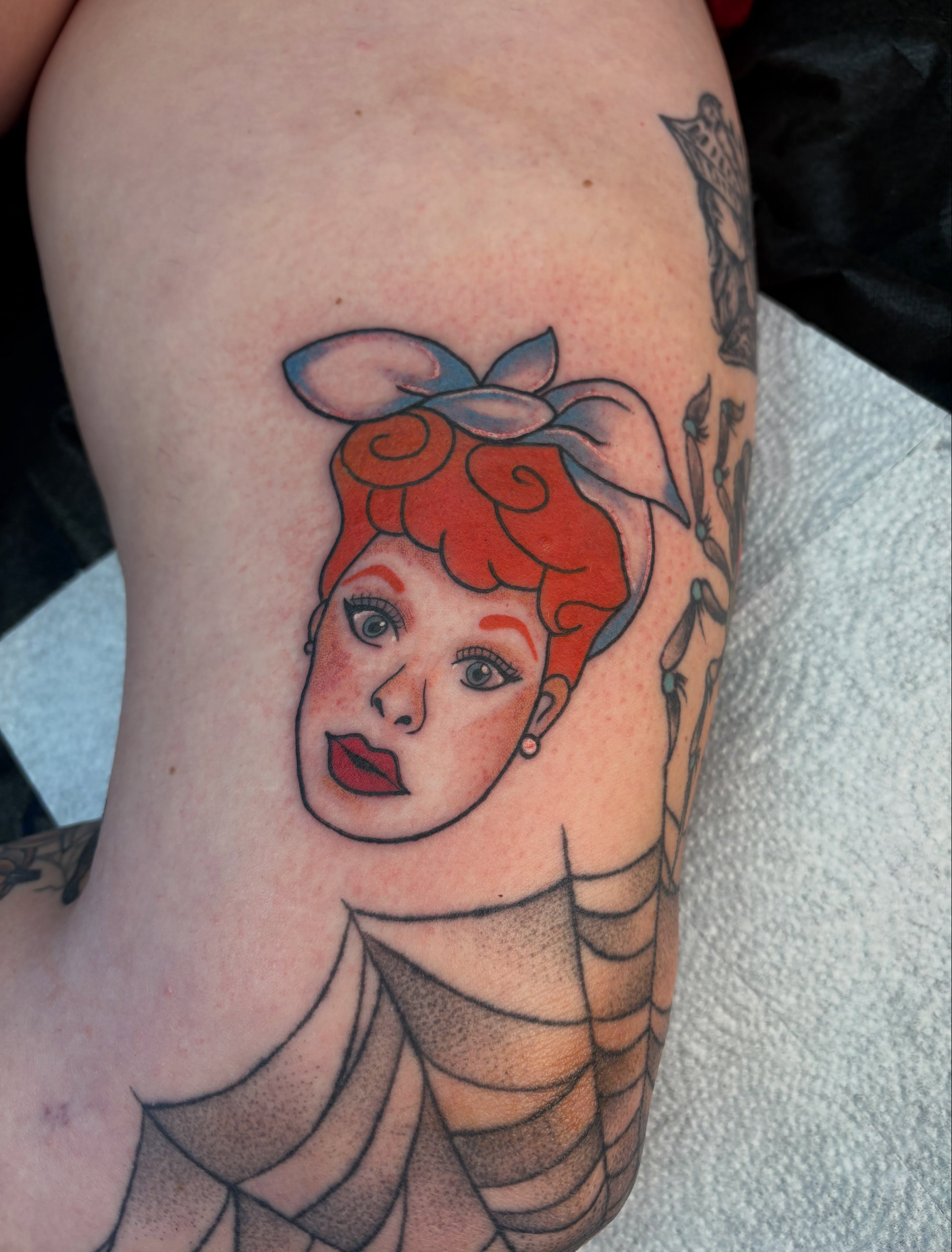 Woman with red hair American traditional tattoo on the thigh by ♡ Demi ♡