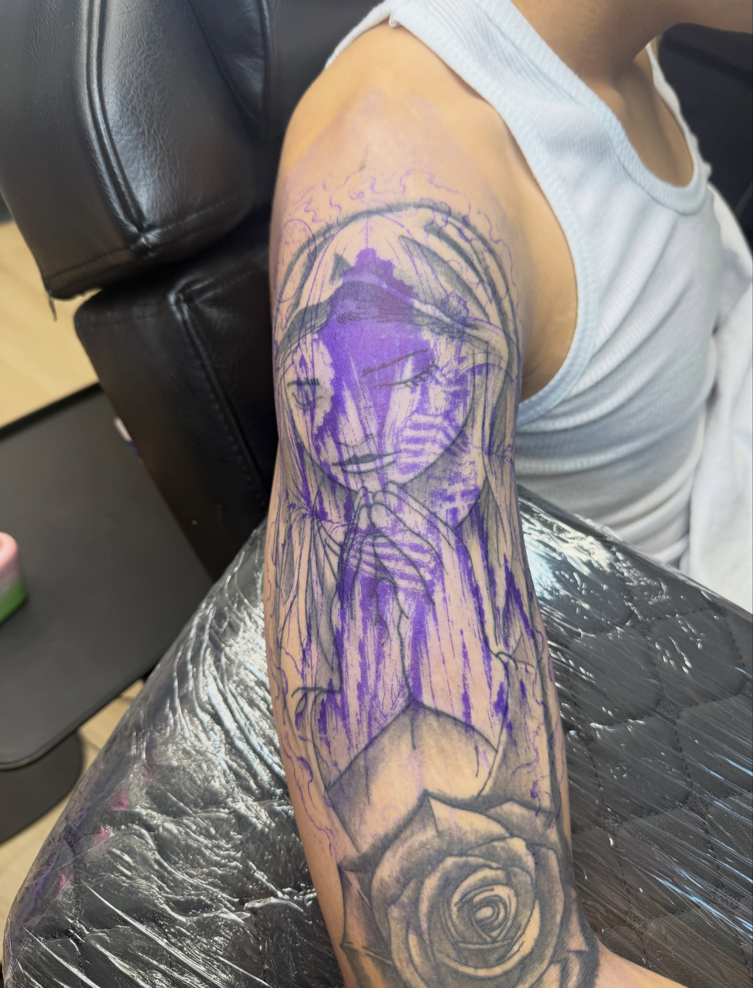 Woman with rose black and grey tattoo on the forearm by Kelsoink