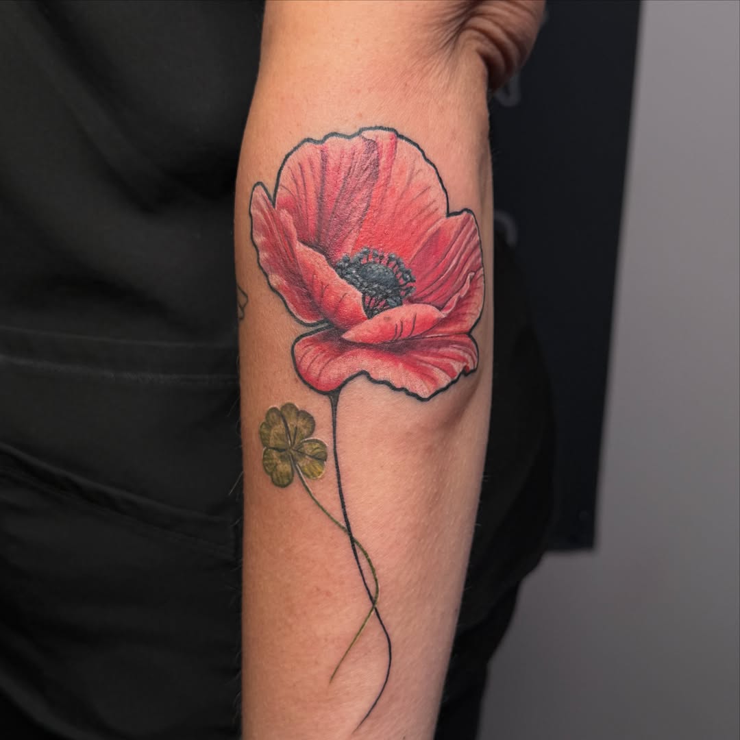 Poppy flower realism tattoo on the forearm by Kelcie Koolaid : Tattoo artwork