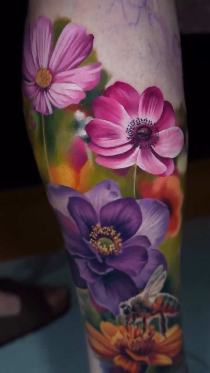 Flowers and a bee realism tattoo by color realism tattoos by gela✨