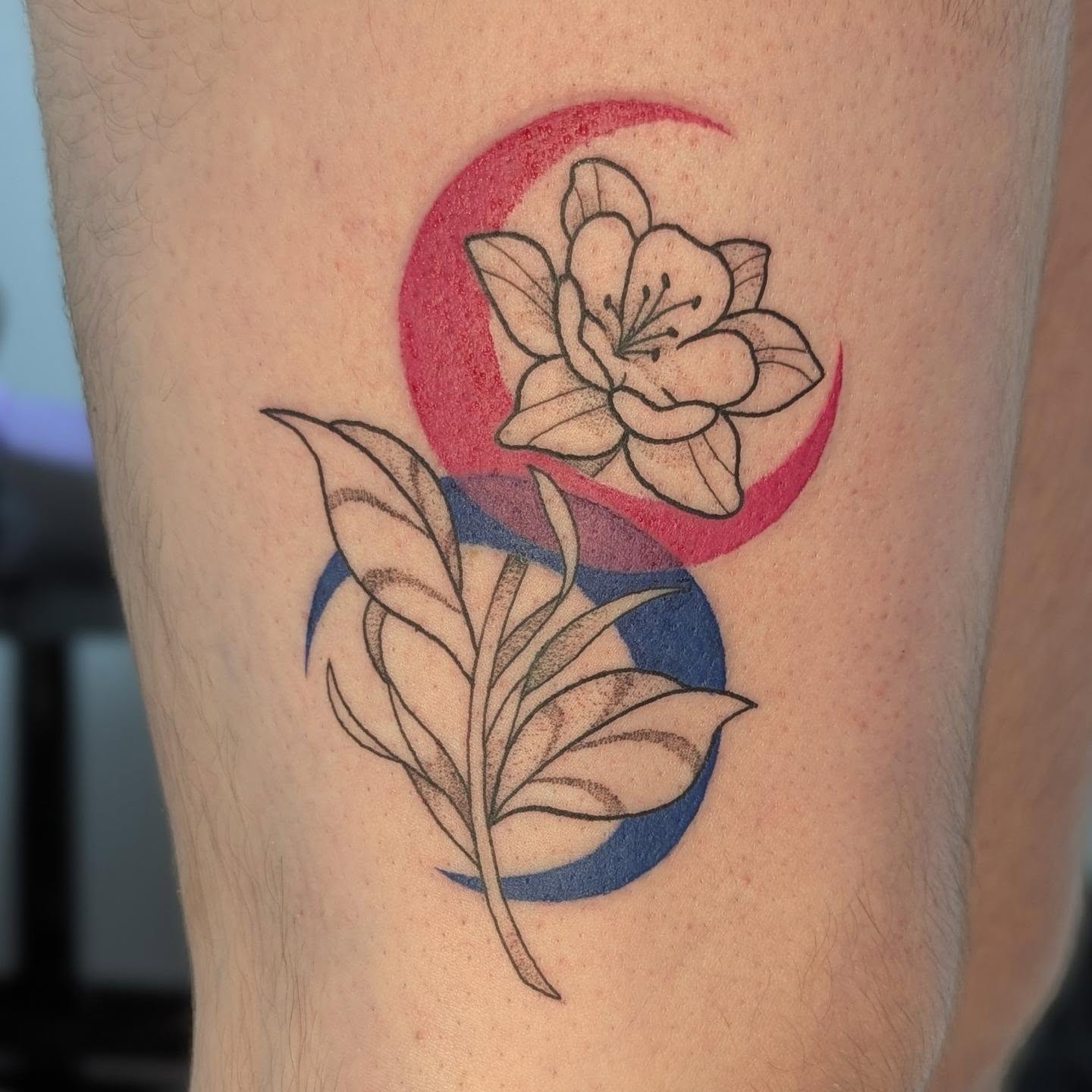 Flower and crescent moon neo-traditional tattoo on the forearm by Spencer Jennings, Westland, Michigan