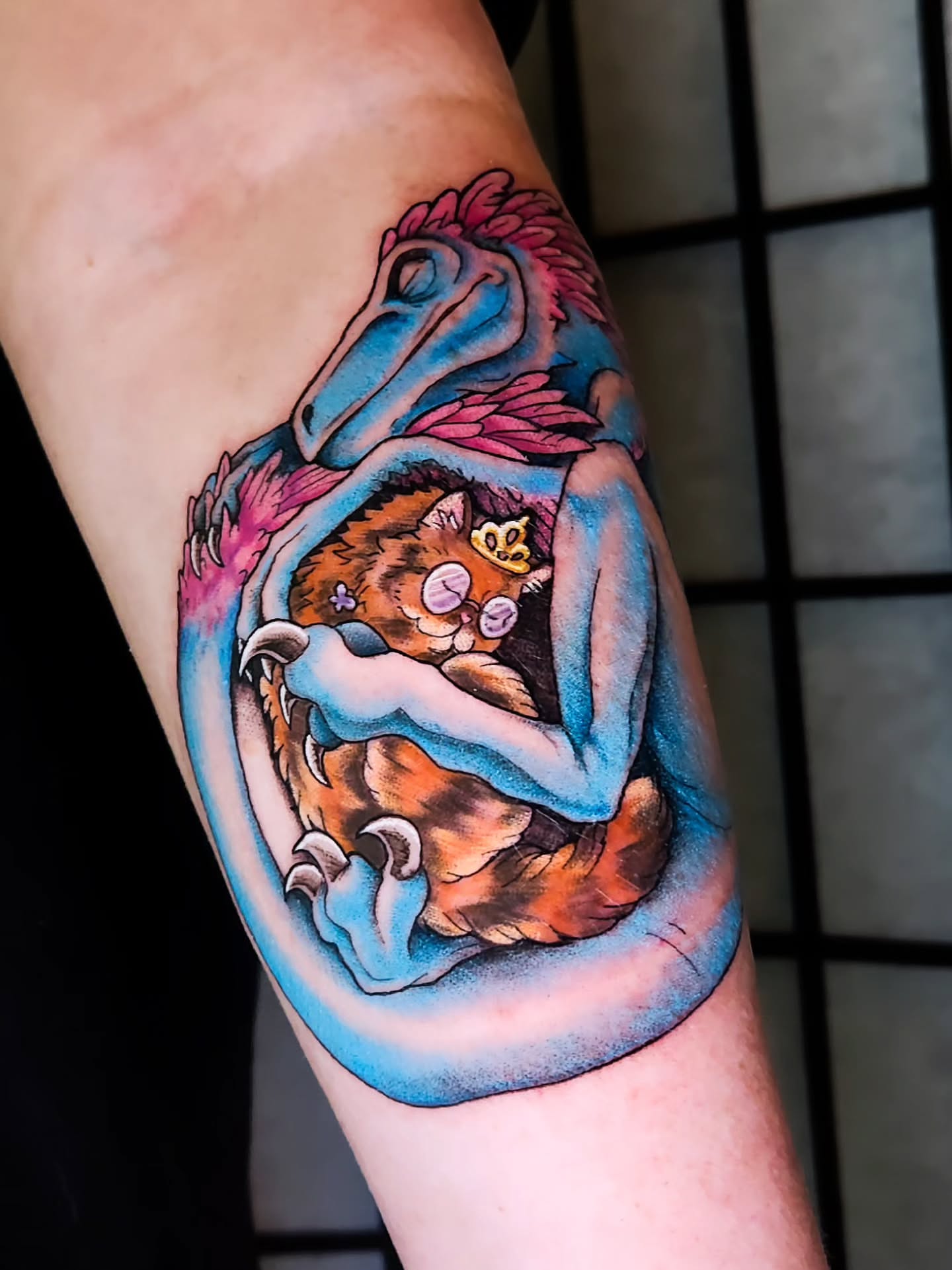Cat and dragon realism tattoo on the forearm by Amanda Boyd - Duh!