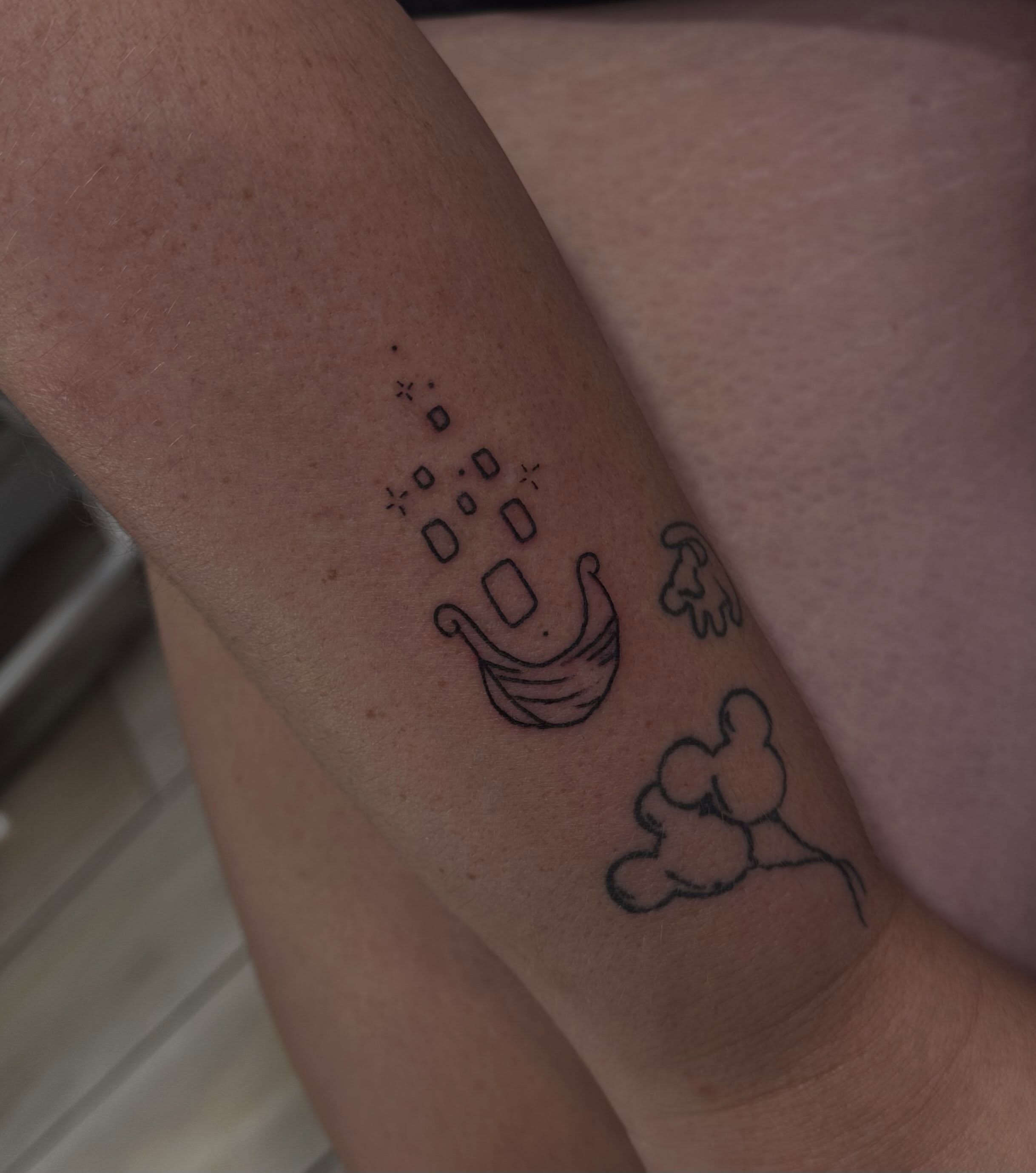 Boat and clouds dotwork tattoo on the forearm by Marly Quinn