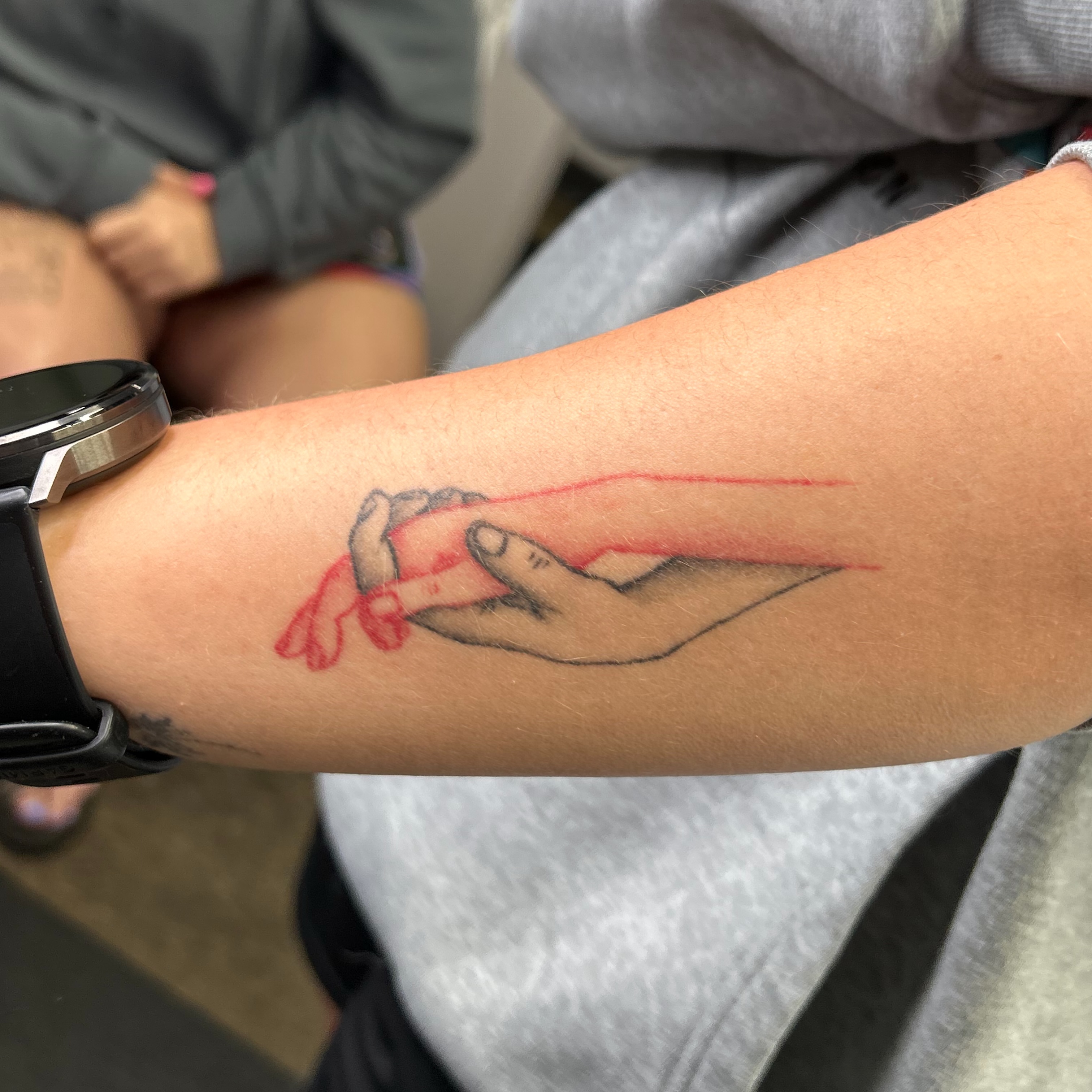 Hands realism tattoo on the forearm by Natalie Johnson, Minneapolis, Minnesota