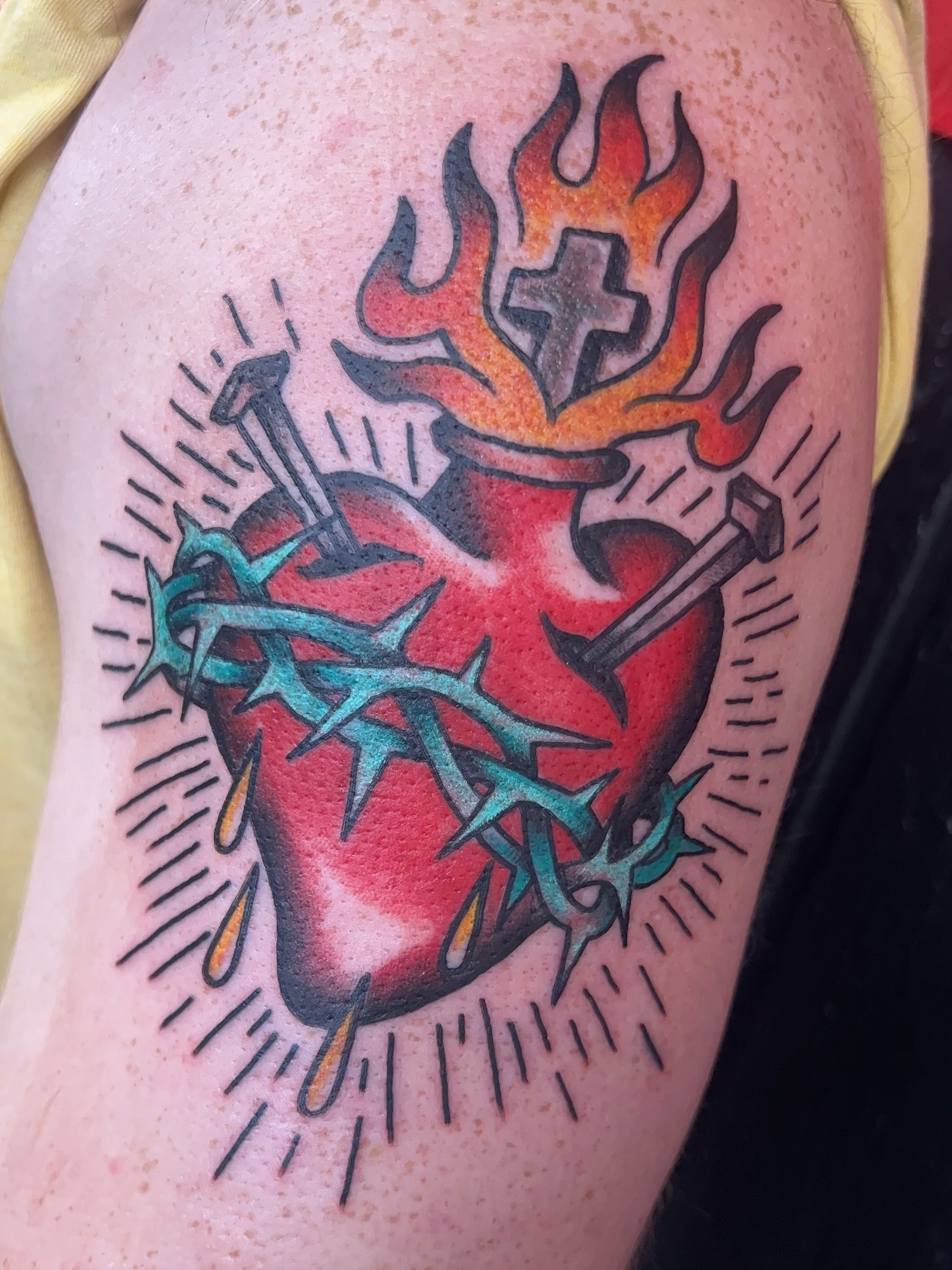 Heart with crown of thorns American traditional tattoo on the shoulder by 𝑴𝒂𝒚𝒂𖤐𝑫𝒆𝑽𝒊𝒏𝒆, Dayton, Ohio