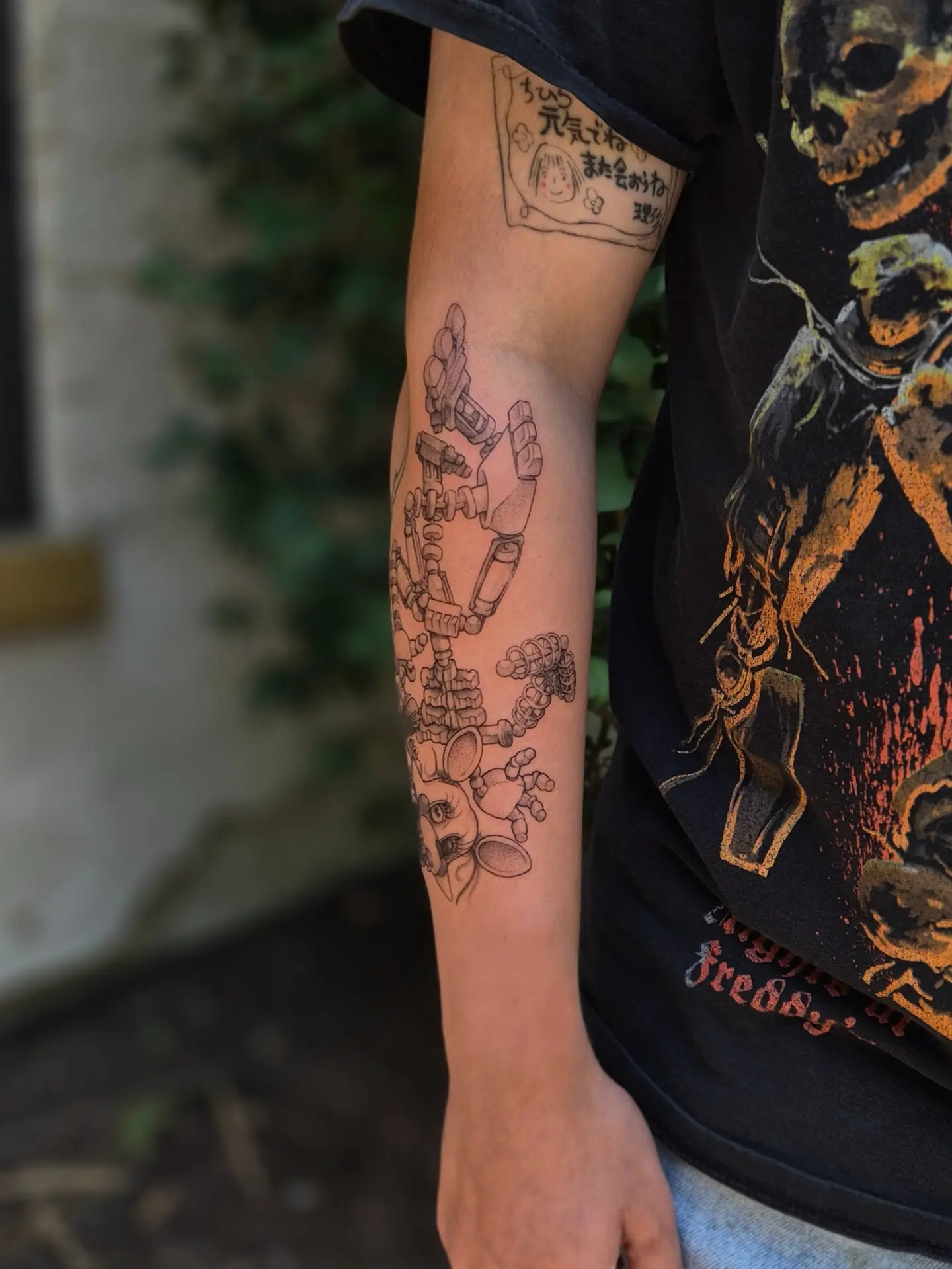 Robotic machinery black and grey tattoo on the forearm by Sophorn Long (soapy)
