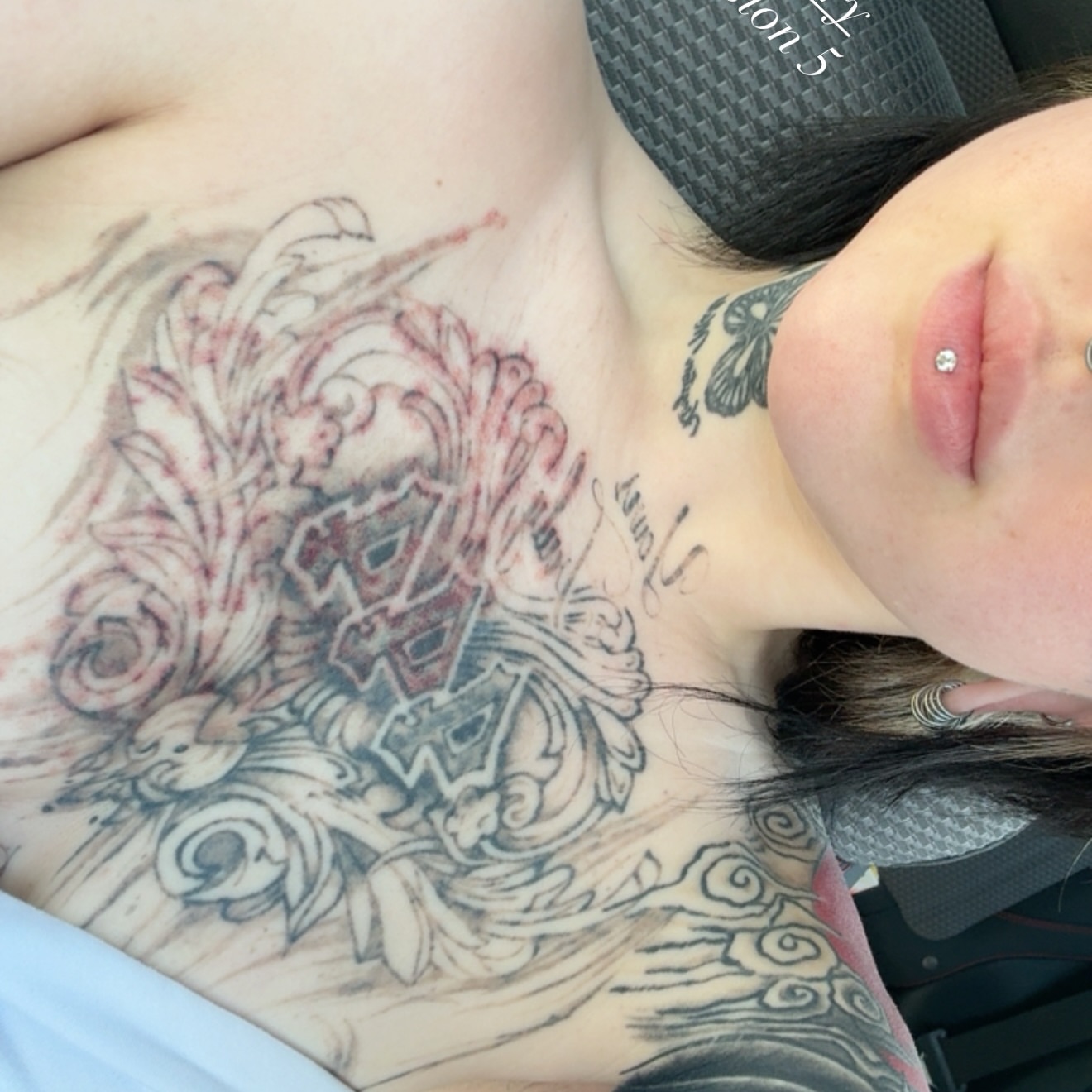 Floral design ornamental tattoo on the chest by Kait