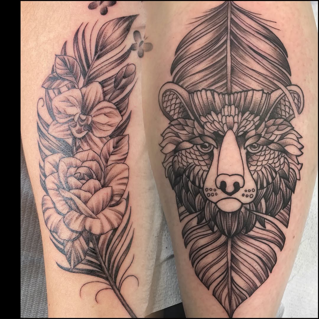 Lion and floral realism tattoo on the forearm by Bryan Hunt
