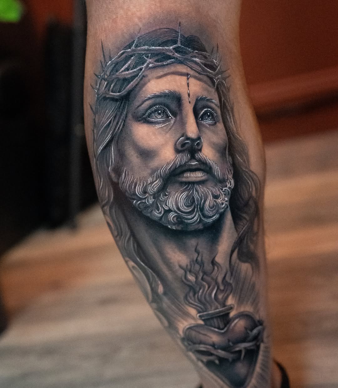 Religious figure realism tattoo on the forearm by Franz Muñoz