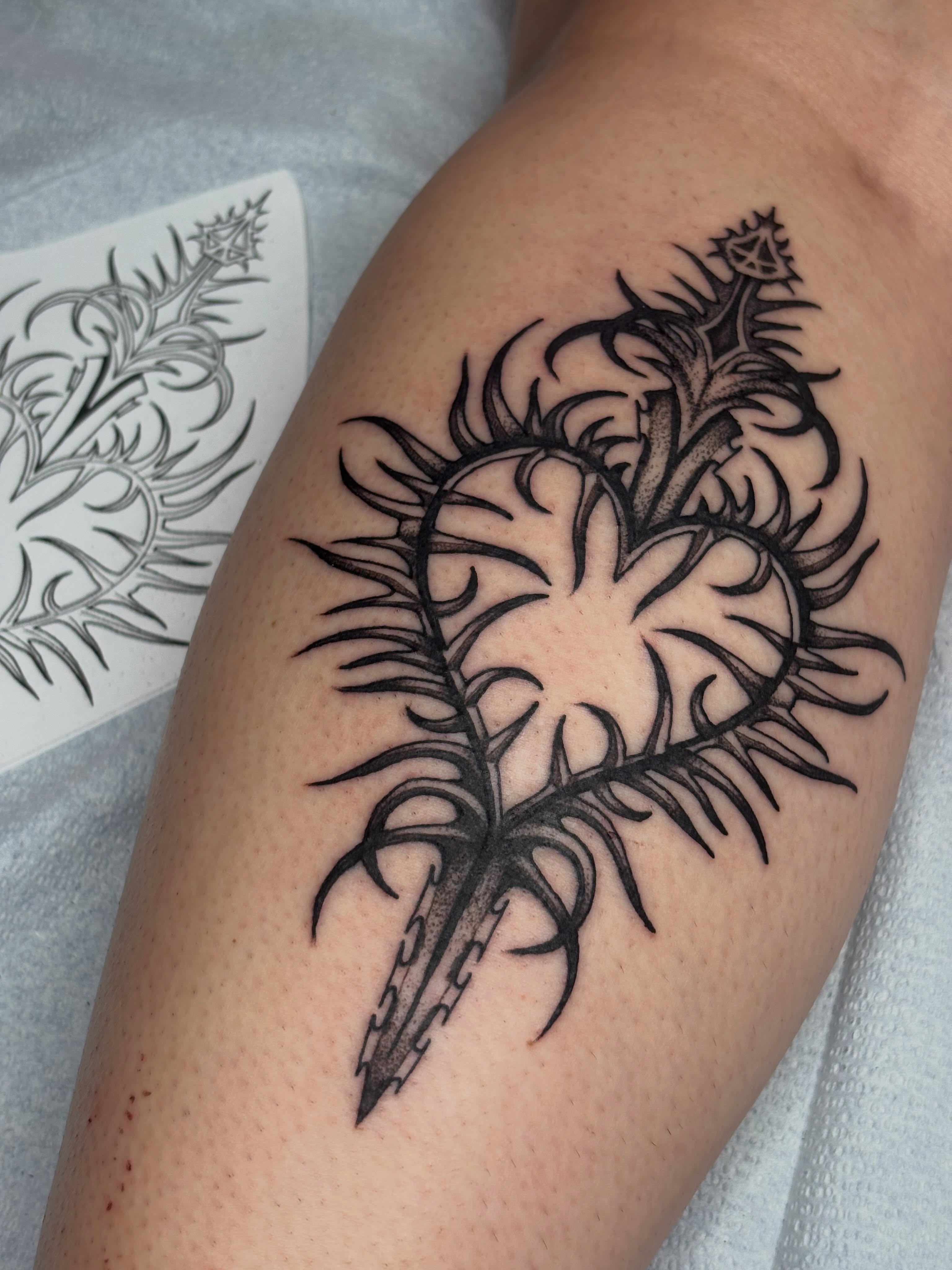 Thistle tribal tattoo on the forearm by Sydney Pflaumer