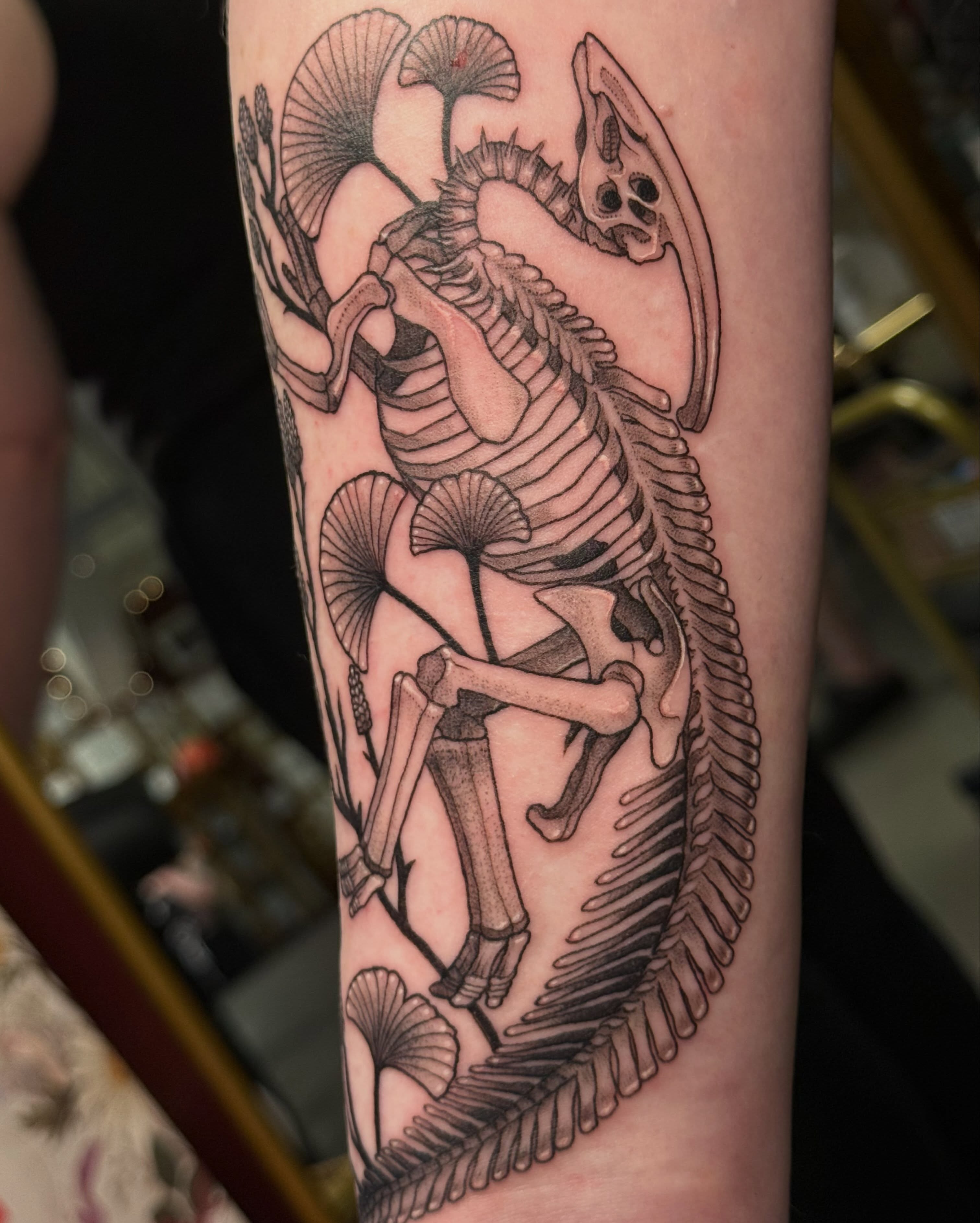 Skeleton horse black and grey tattoo on the forearm by Christian