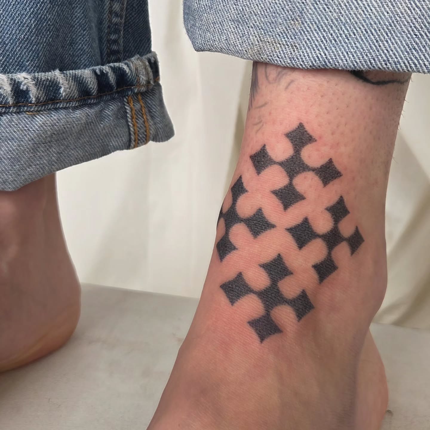 Crosses dotwork tattoo on the forearm by jules tattoos