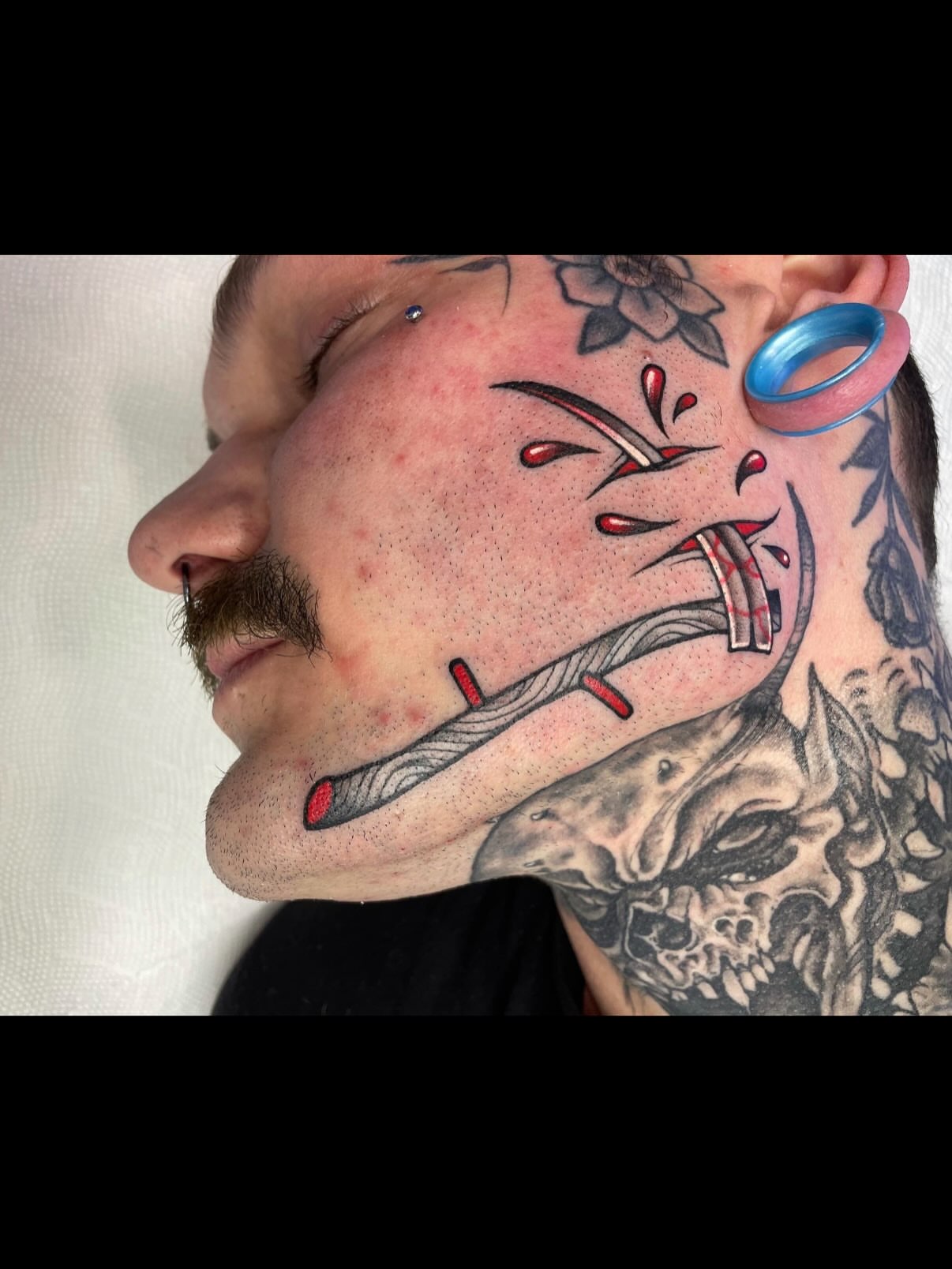 Oral wound dotwork tattoo by Mark Boller