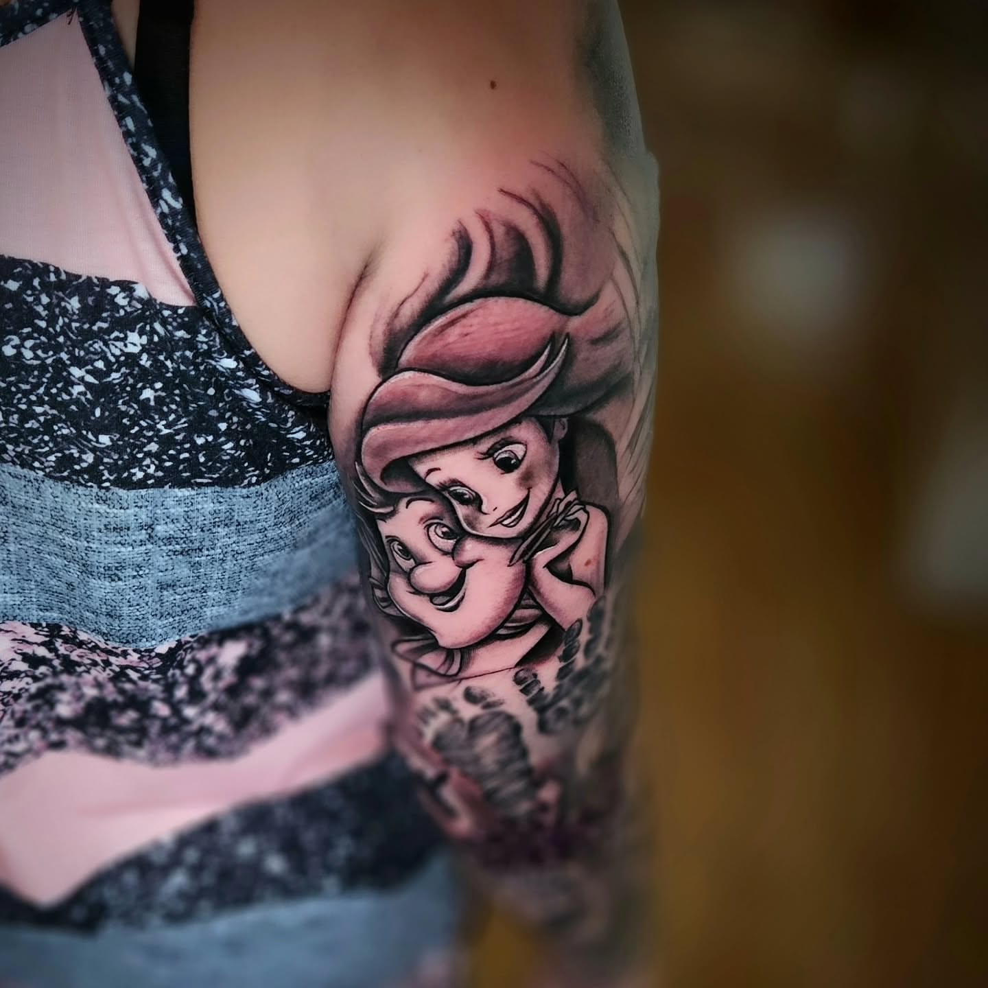 Mermaid and seahorse realism tattoo on the upper arm by Justin J-rust Smith