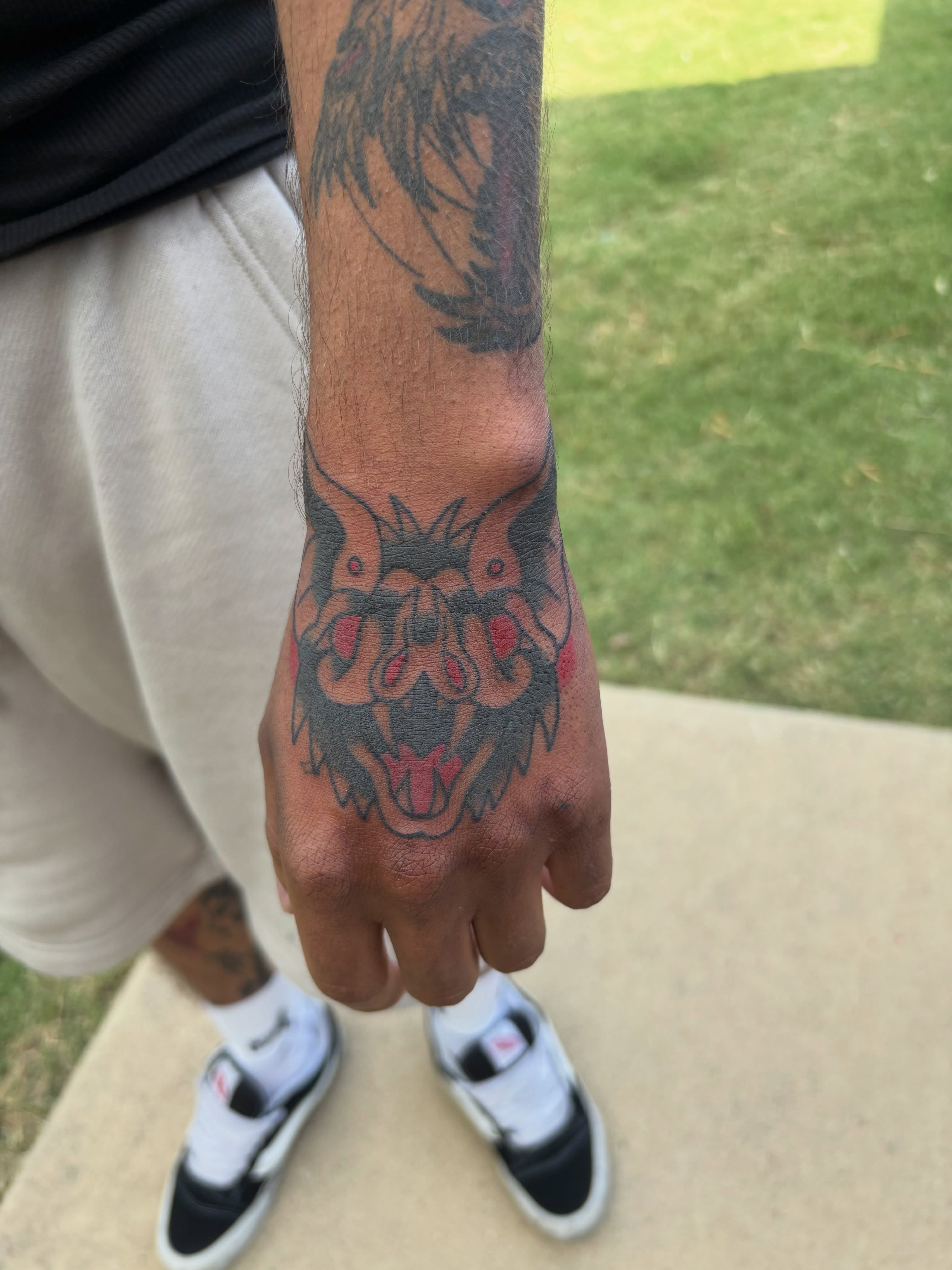 Wolf American traditional tattoo on the forearm by Ethan Ellis, Dallas, Texas