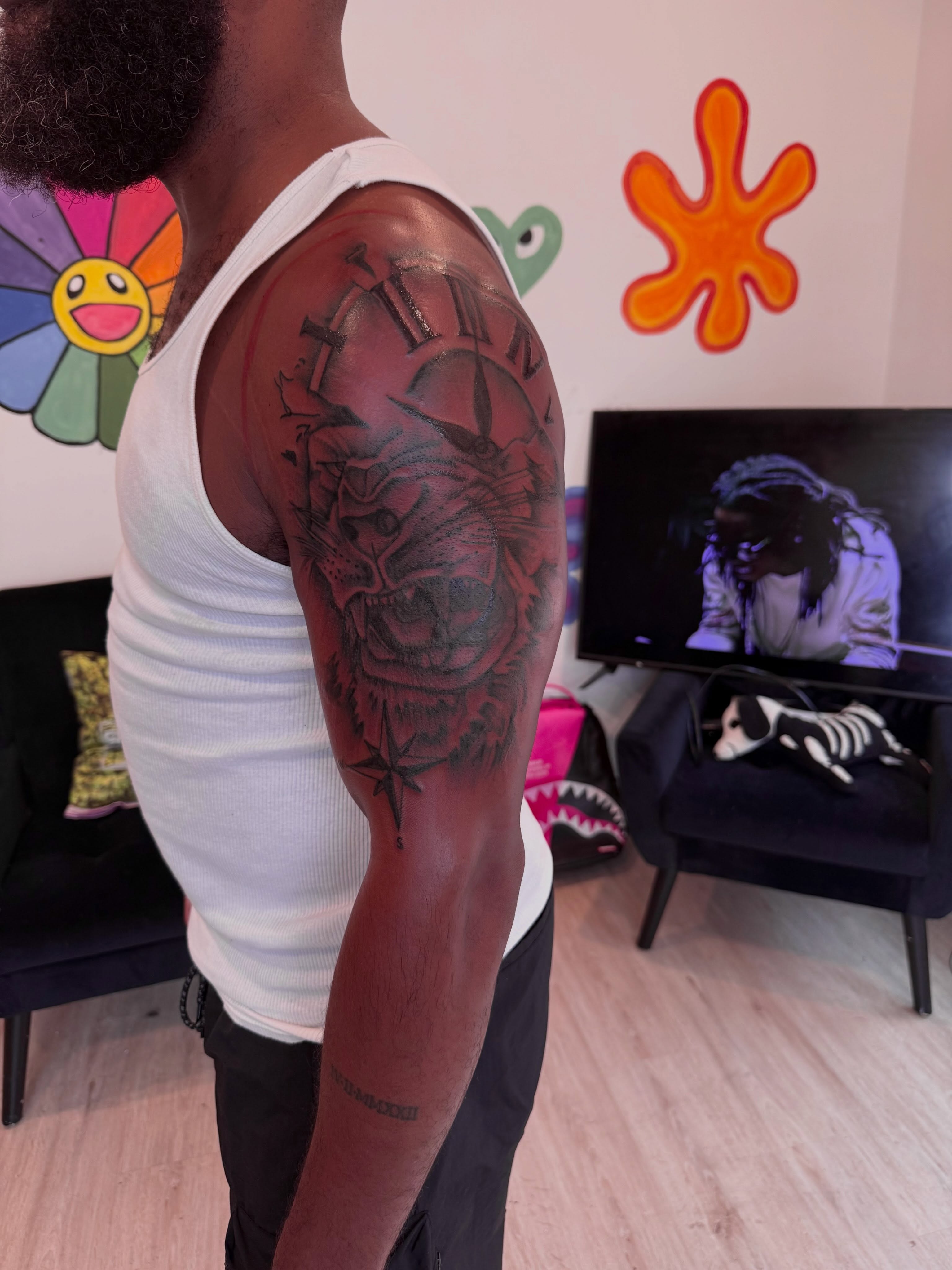Lion black and grey tattoo on the upper arm by inkedbylii, Philadelphia, Pennsylvania