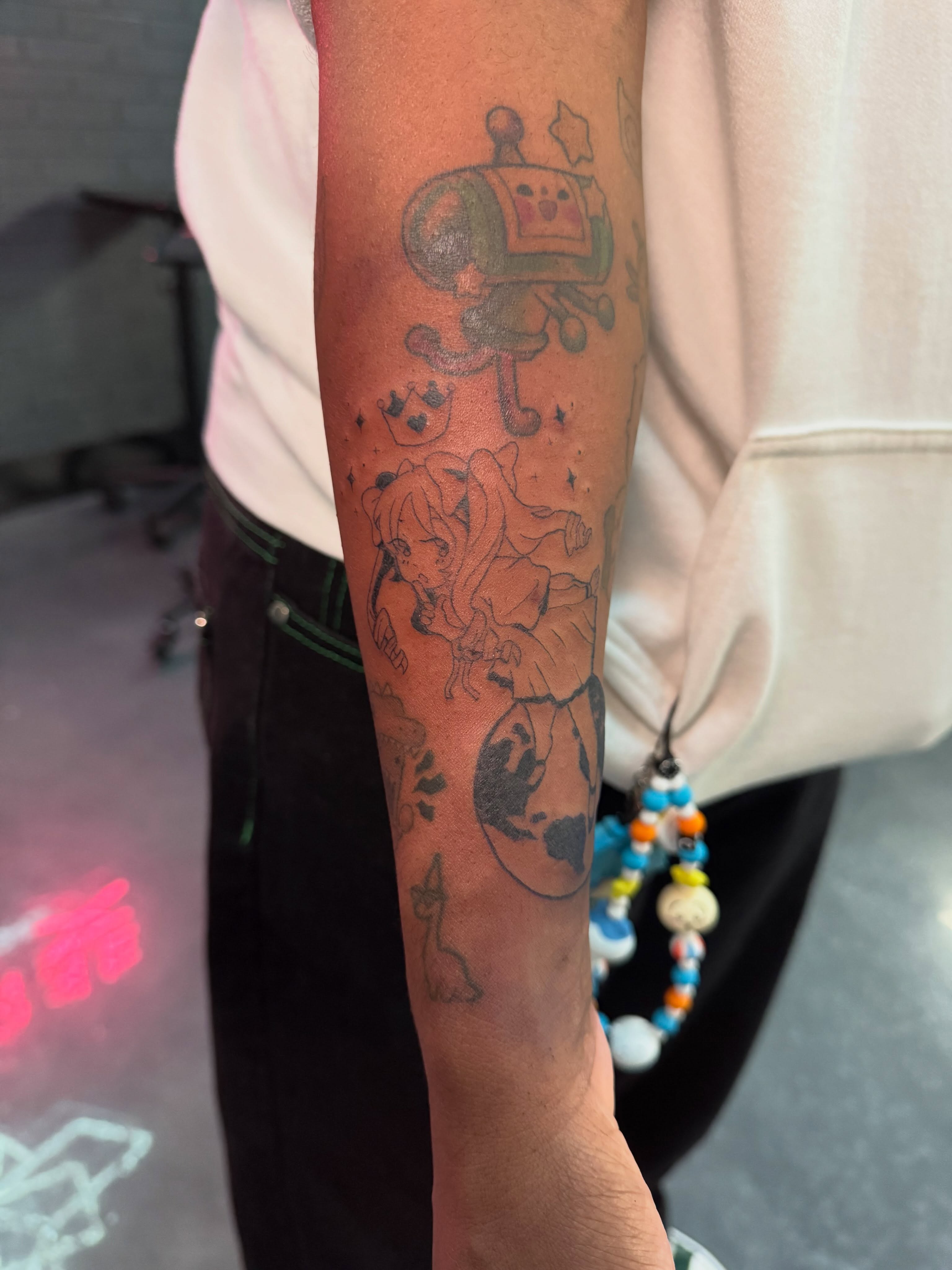 Anime character anime tattoo on the forearm by Bunny 🐰