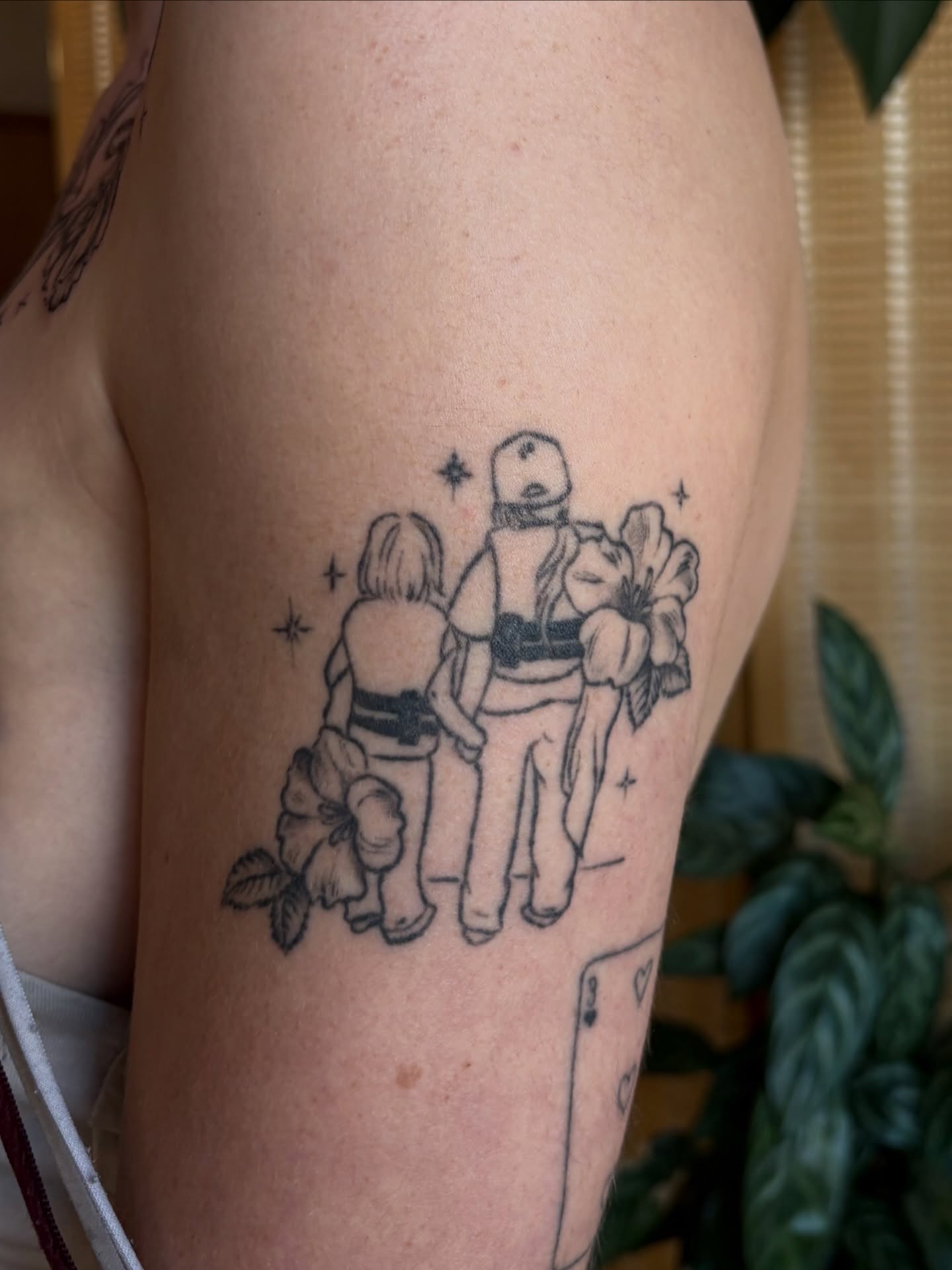 Astronaut and child black and grey tattoo on the thigh by emery ♡ slc utah tattoo artist