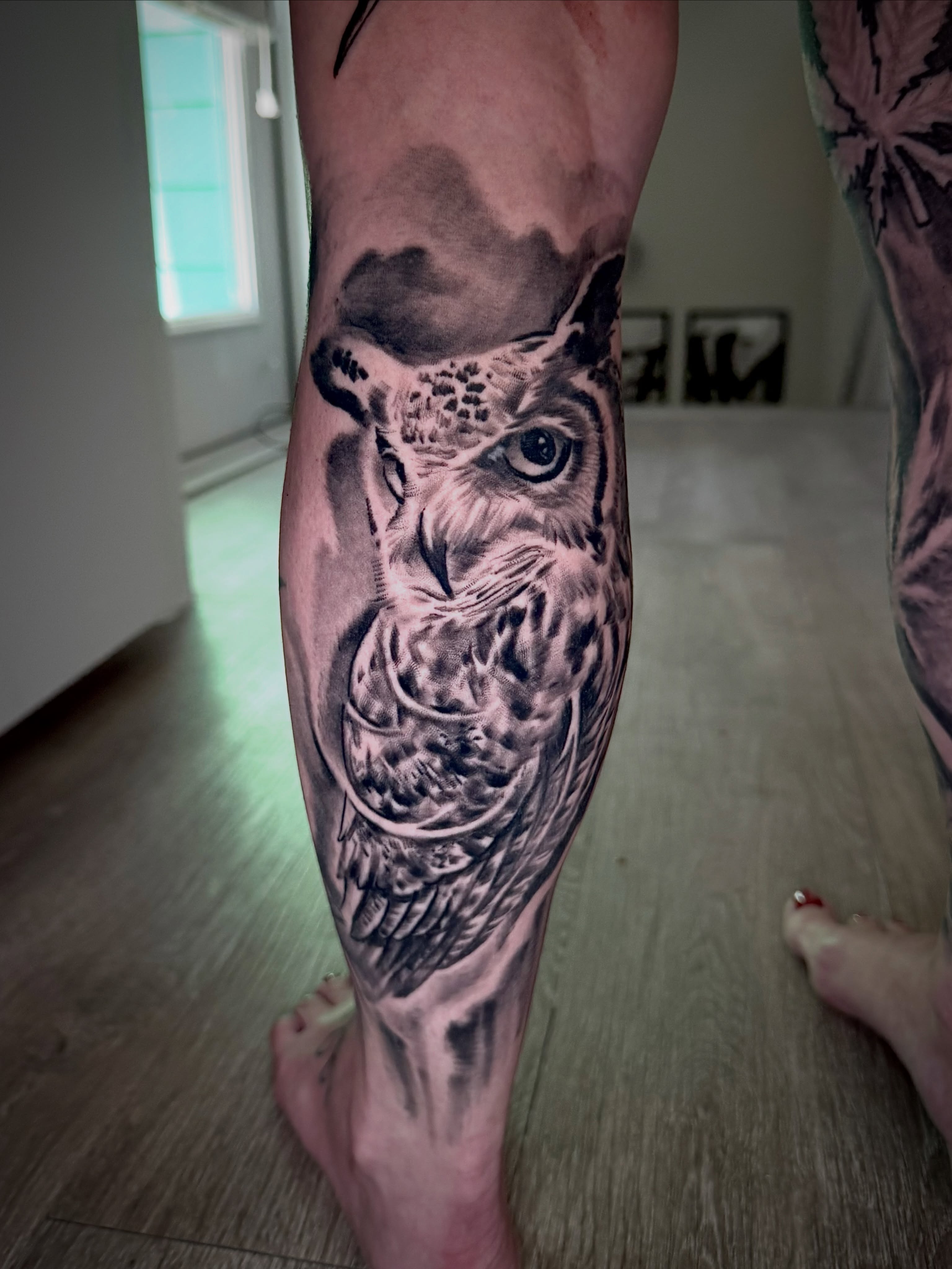Owl realism tattoo on the calf by James ⚡️ Tattoo Artist