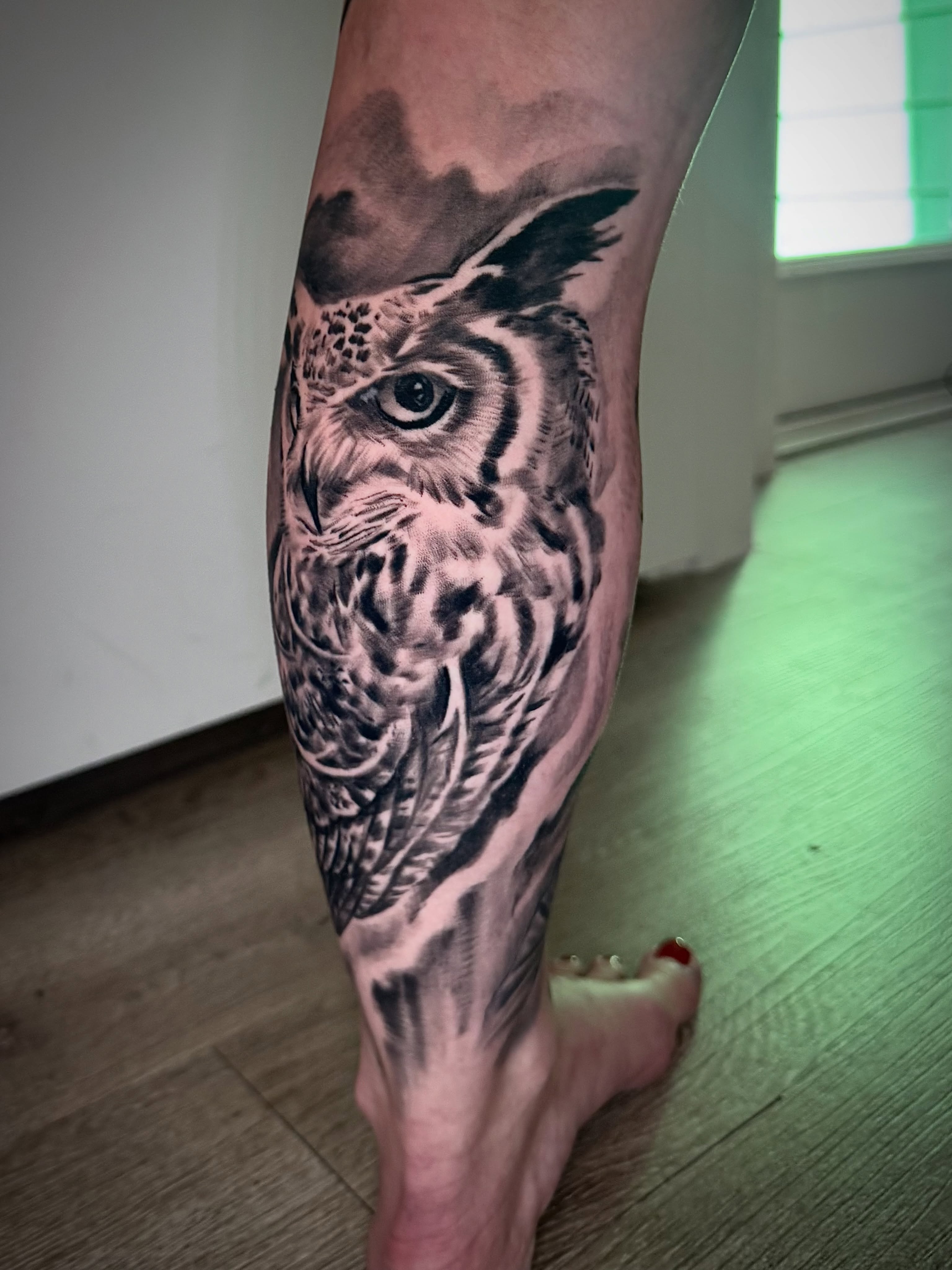 Owl realism tattoo on the calf by James ⚡️ Tattoo Artist
