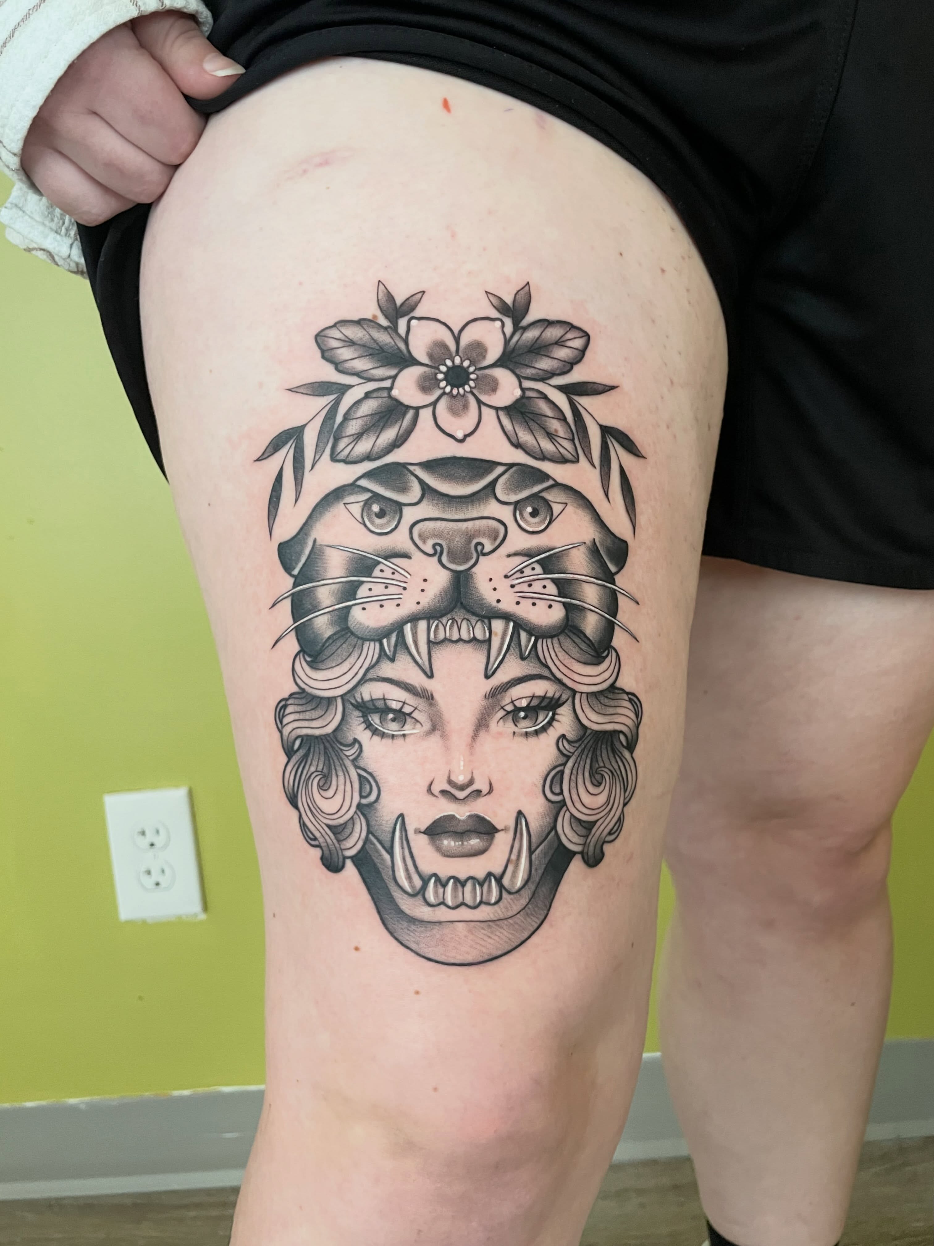 Woman with tiger realism tattoo on the thigh by ✨Erin Haines✨