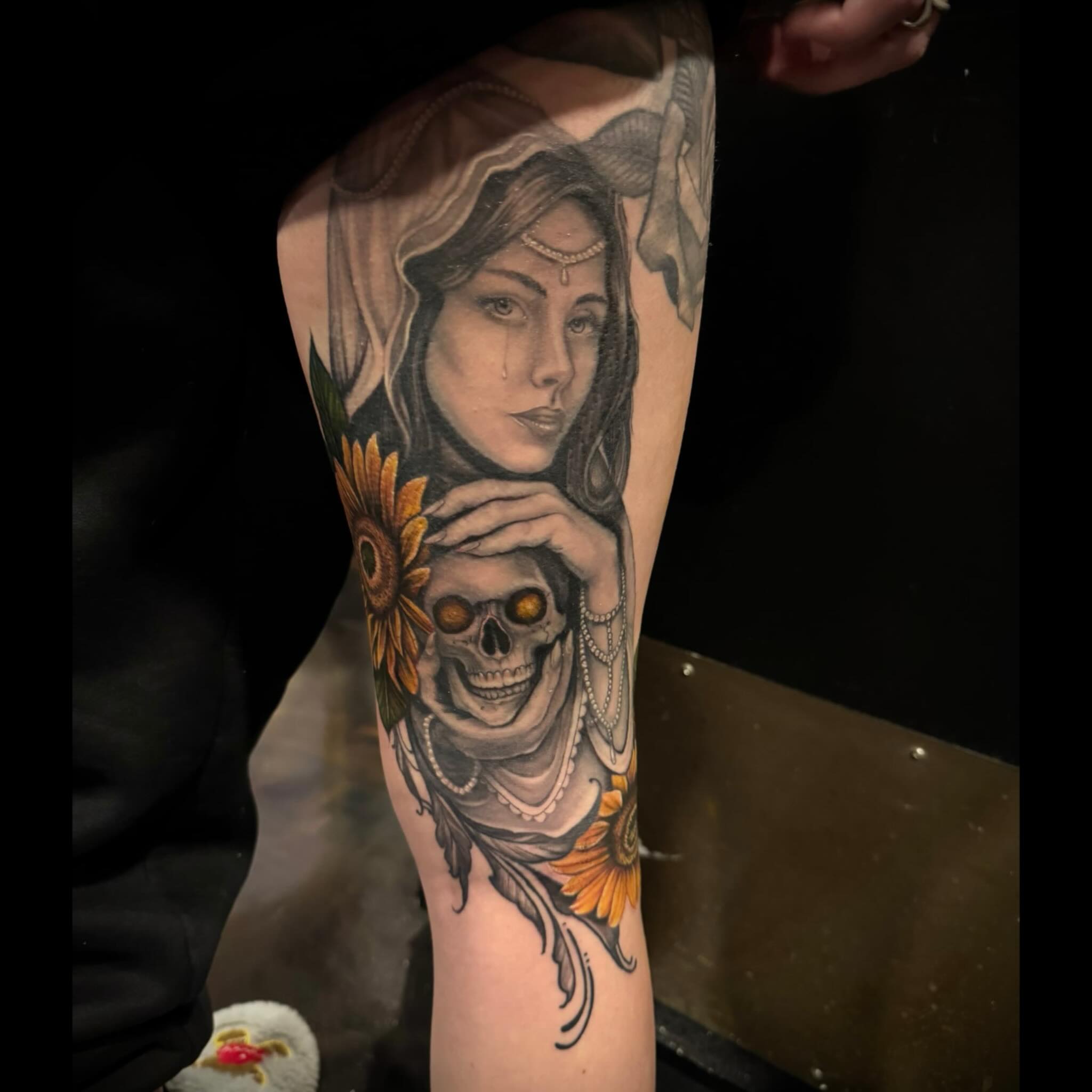 Woman with skull realism tattoo on the forearm by Shae Sullivan