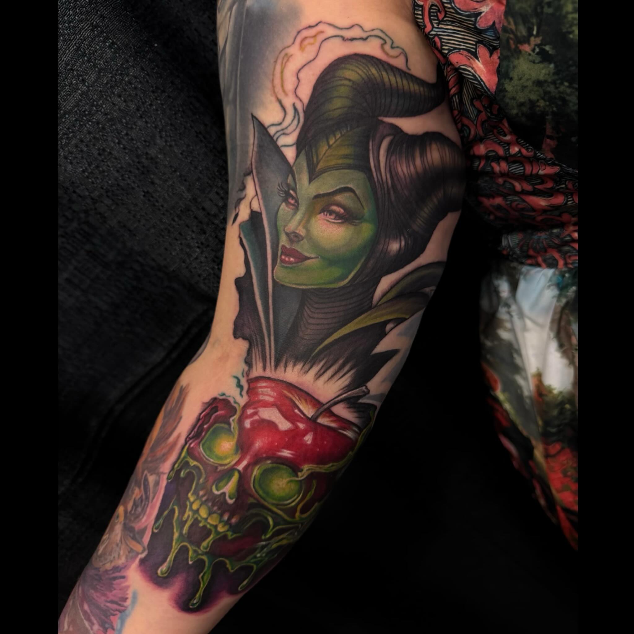 Maleficent dark realism tattoo on the forearm by Shae Sullivan