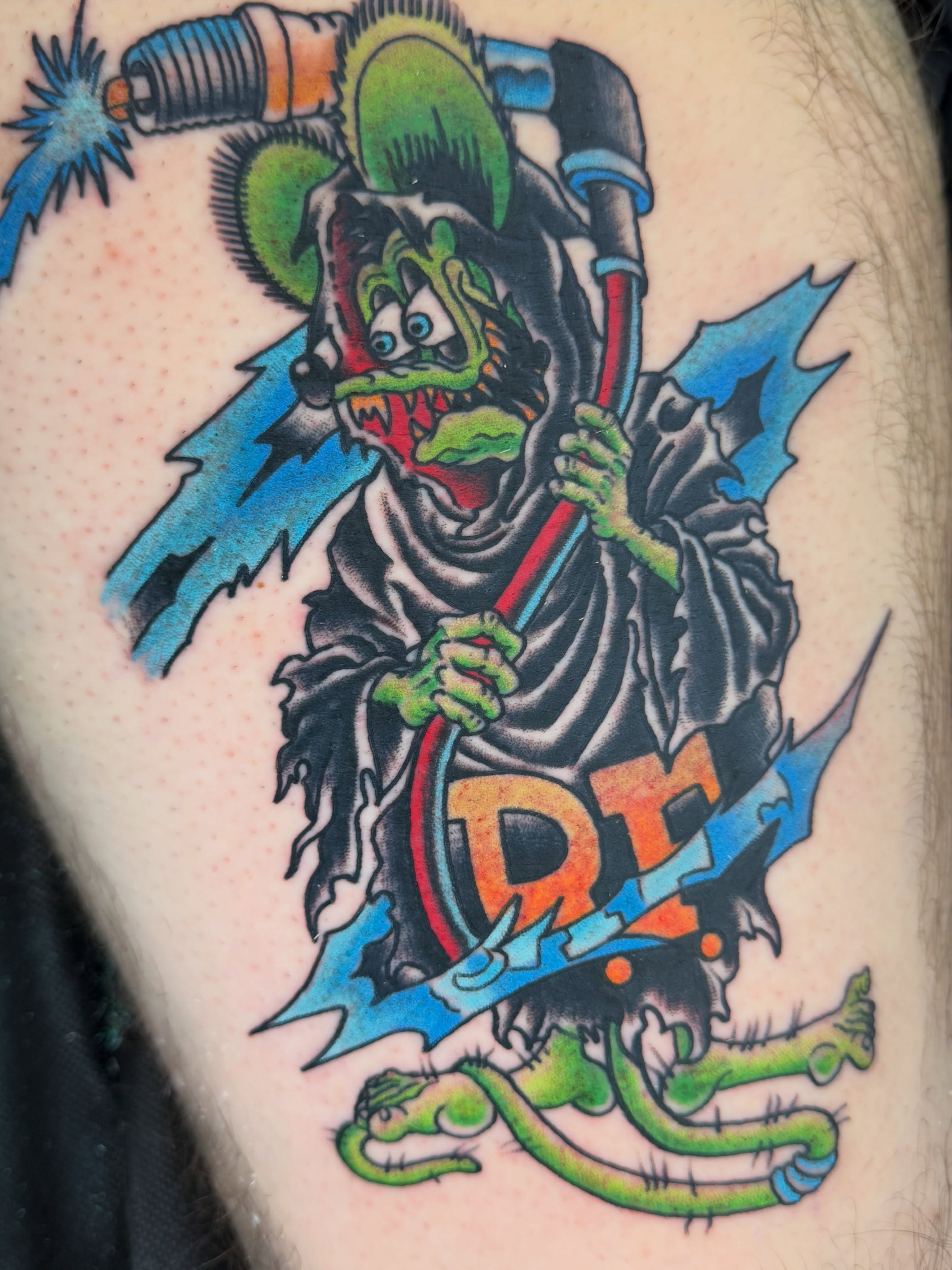 Jester with weapon American traditional tattoo on the thigh by Trent Parsley