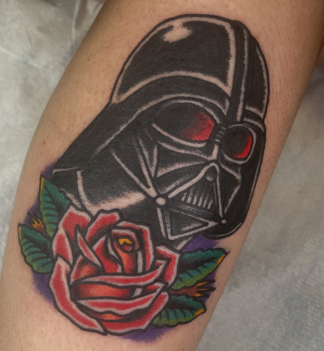 Darth vader helmet and rose American traditional tattoo on the thigh by Francis Kane