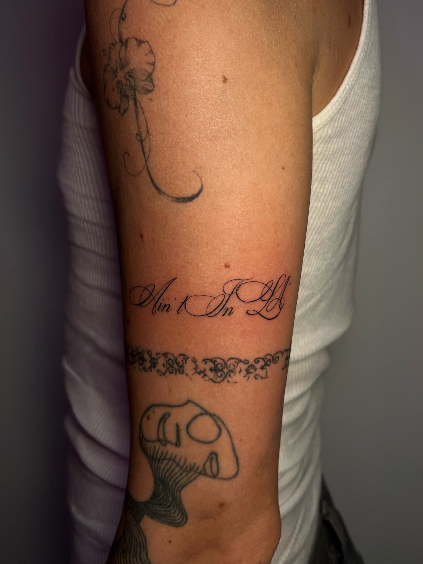 Script lettering lettering script tattoo on the forearm by MK