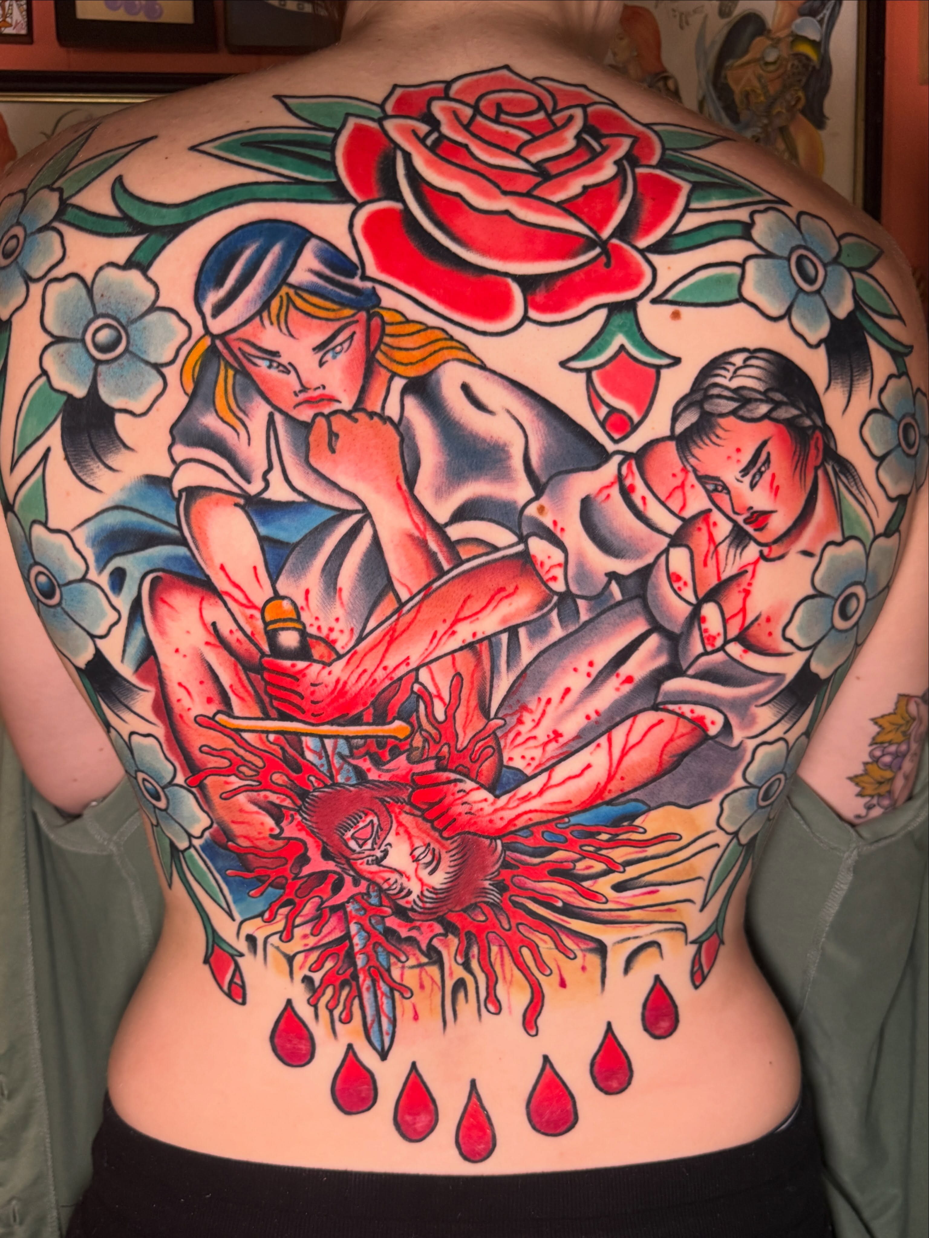 Female figures and roses American traditional tattoo on the back by Cassie O'Neal DeBord
