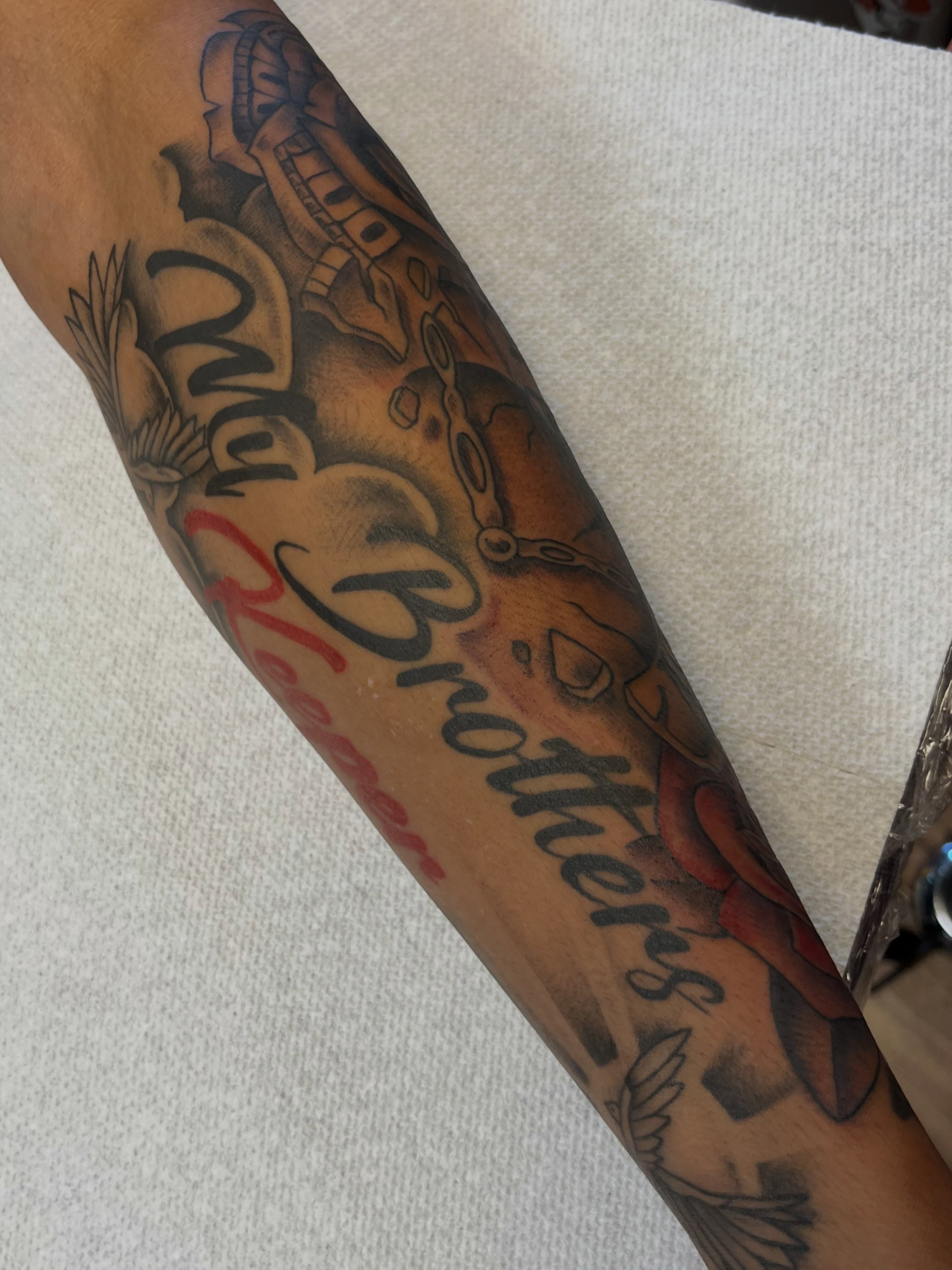 Brothers American traditional tattoo on the forearm by Danielle Lorandeau
