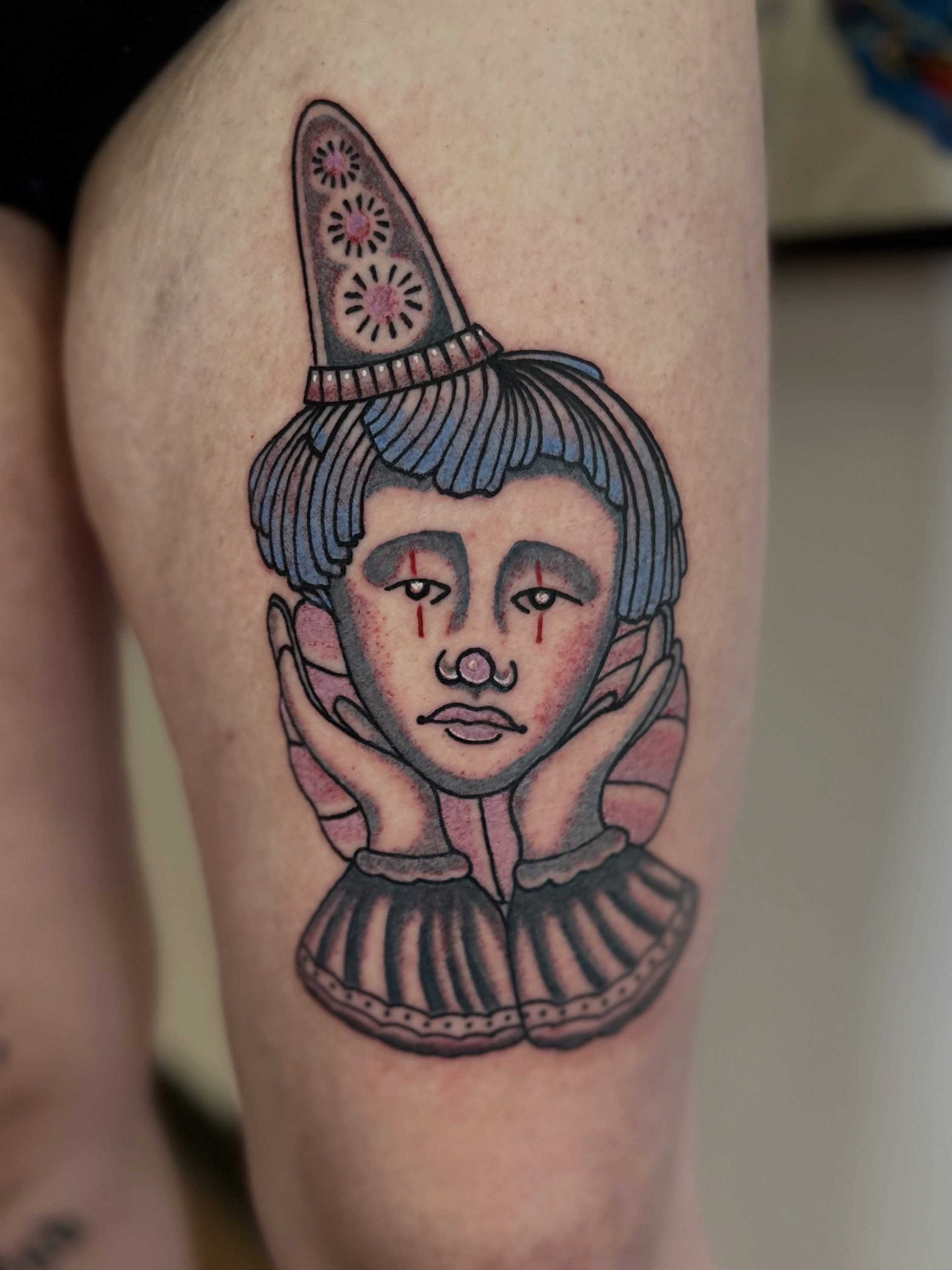 Clown neo-traditional tattoo on the thigh by Nick Weaver aka gibby sometimes gilbert