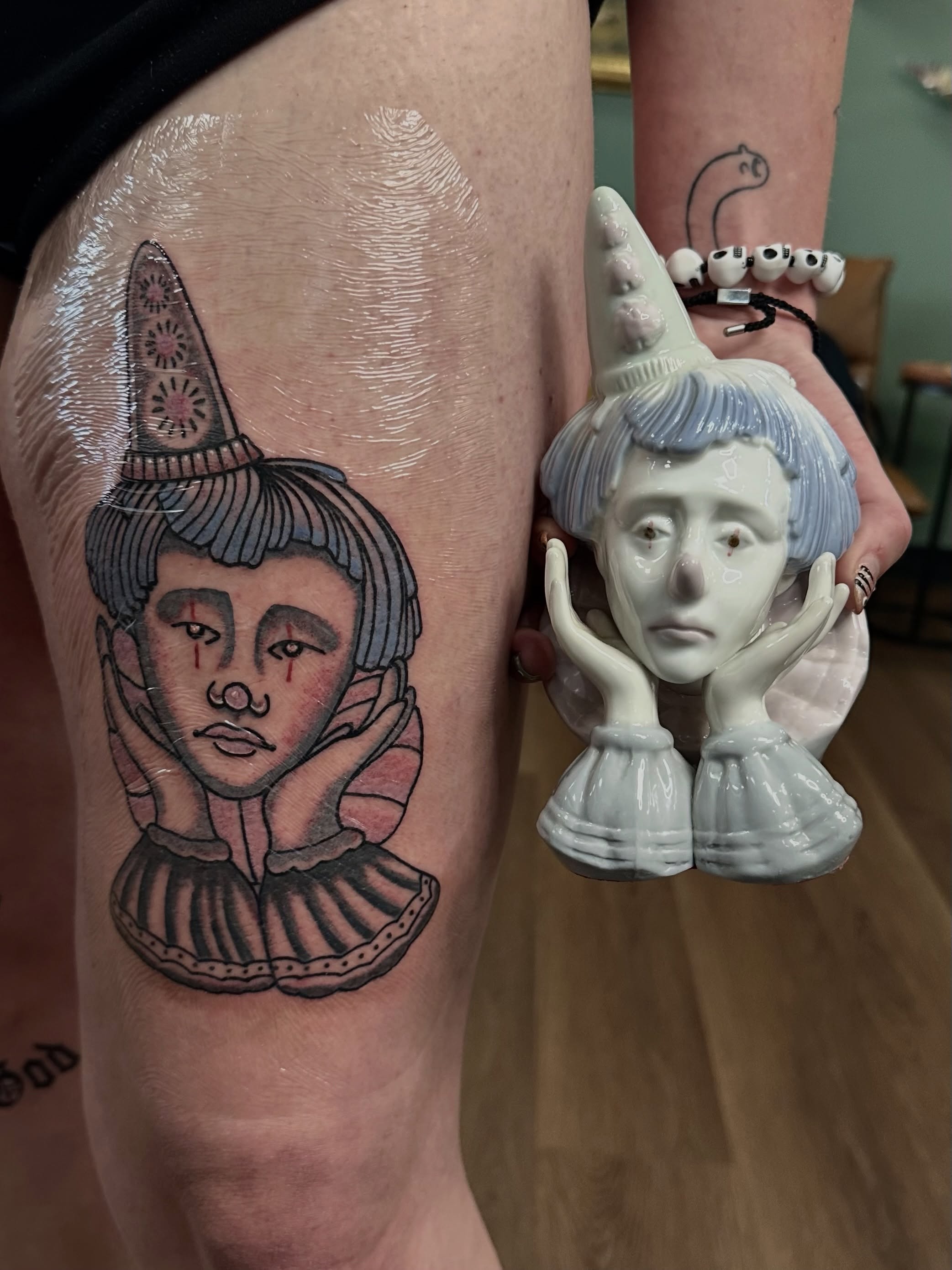 Clown neo-traditional tattoo on the thigh by Nick Weaver aka gibby sometimes gilbert