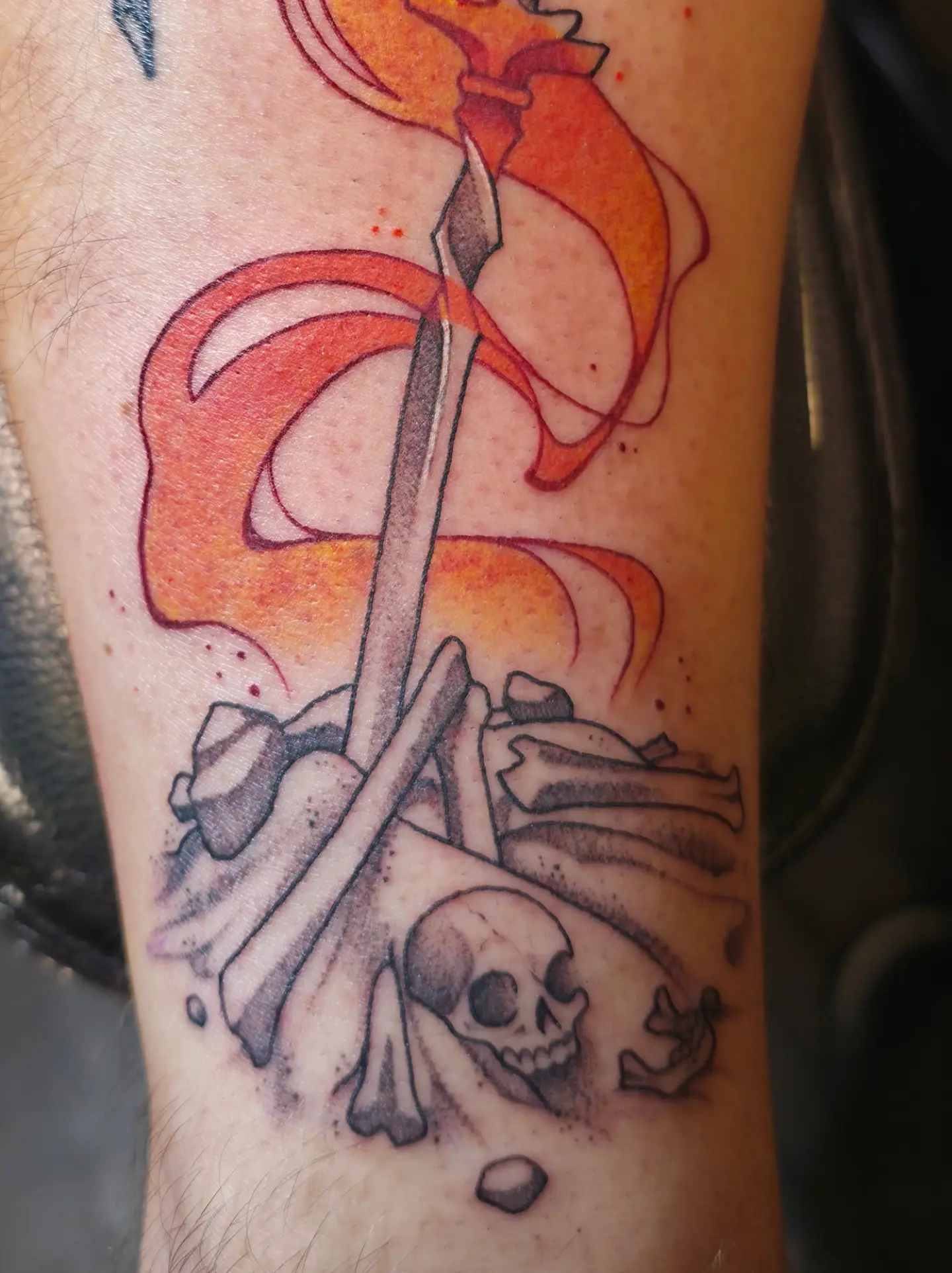 Sailor girl and skull American traditional tattoo on the forearm by Kennedy Jones, Lee's Summit, Missouri