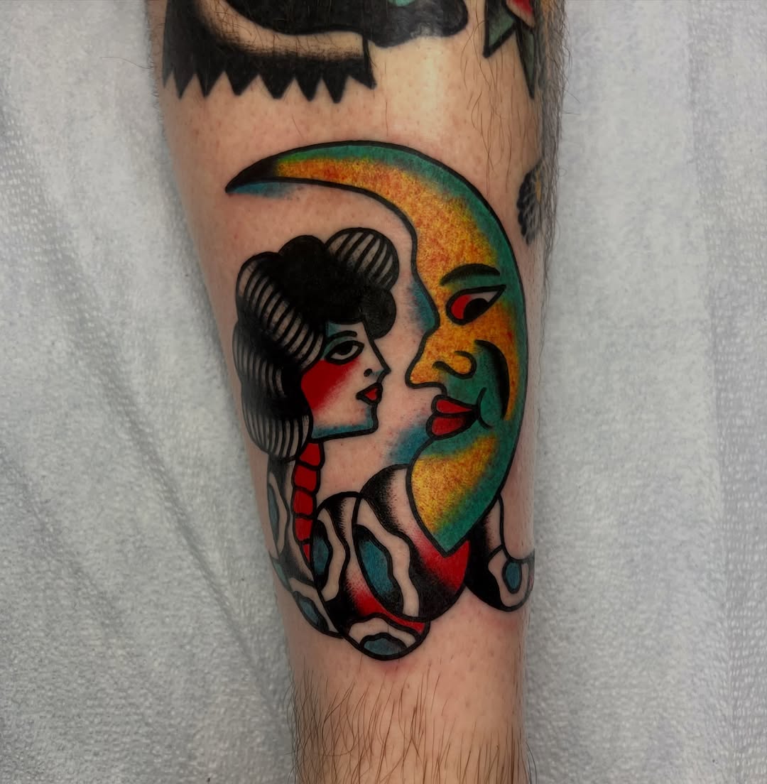 Woman and moon face neo-traditional tattoo on the forearm by Darren Malekoff