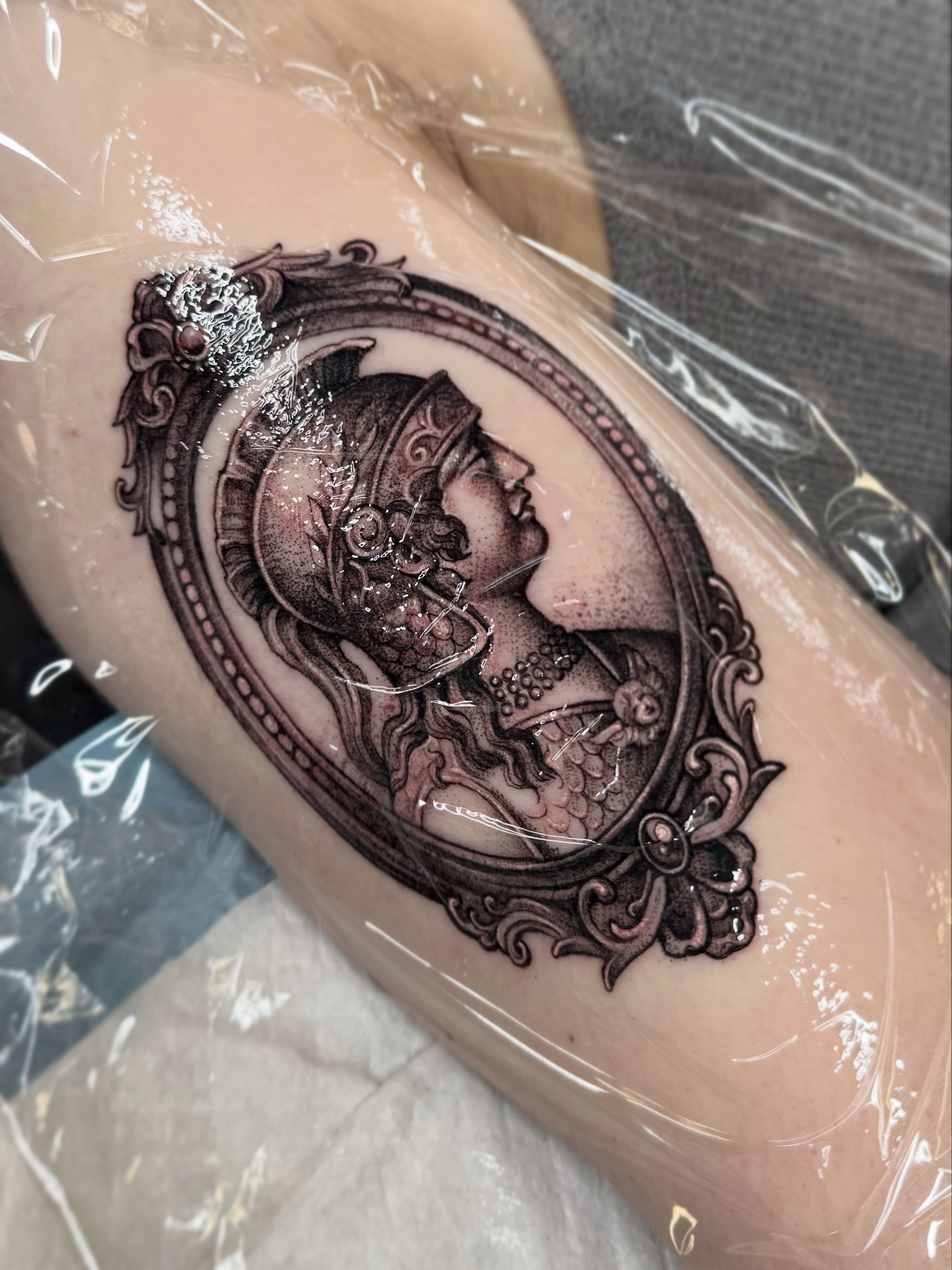 Woman with crown realism tattoo on the forearm by Andy Rowe- Tattoo Artist🦇