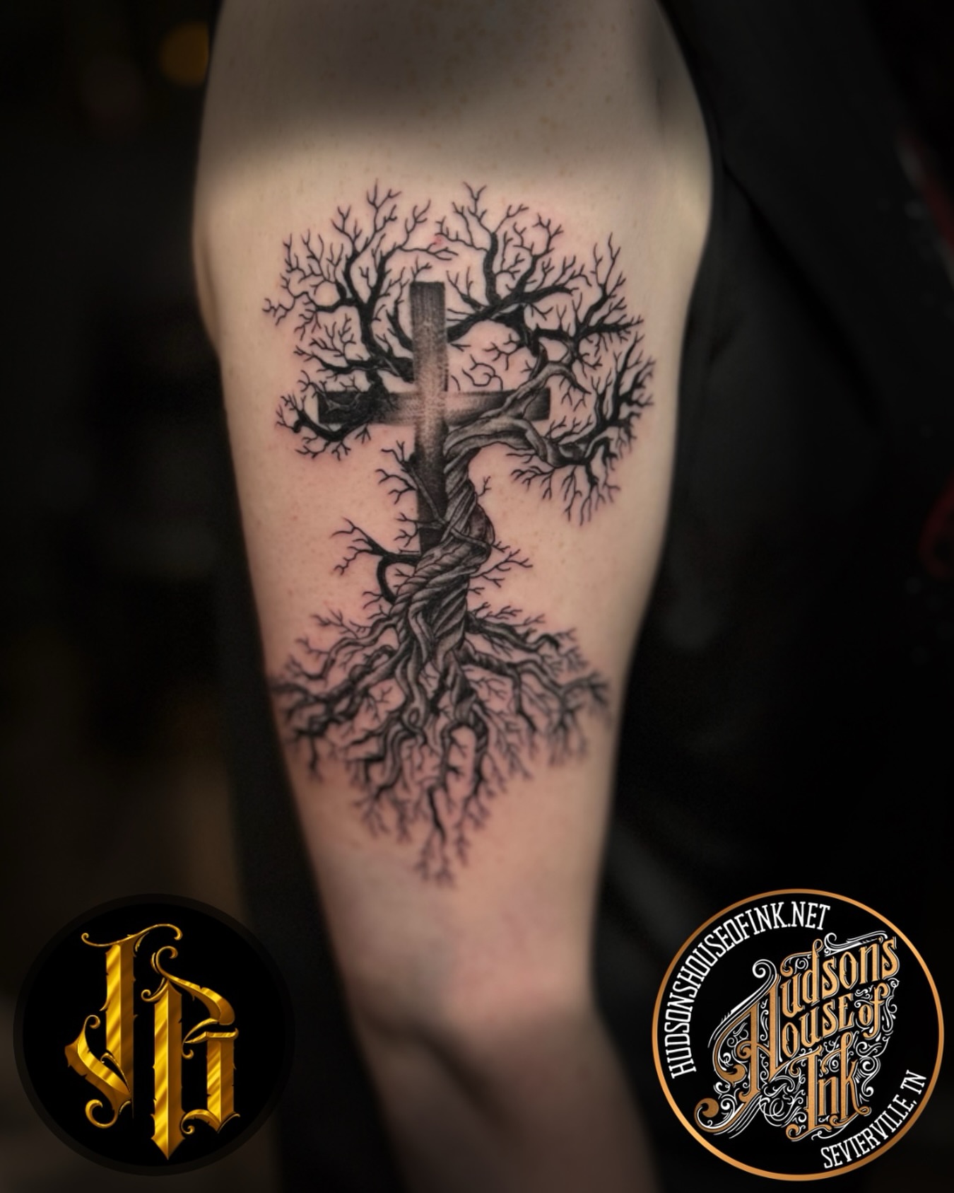 Cross and tree realism tattoo on the forearm by James Brooks