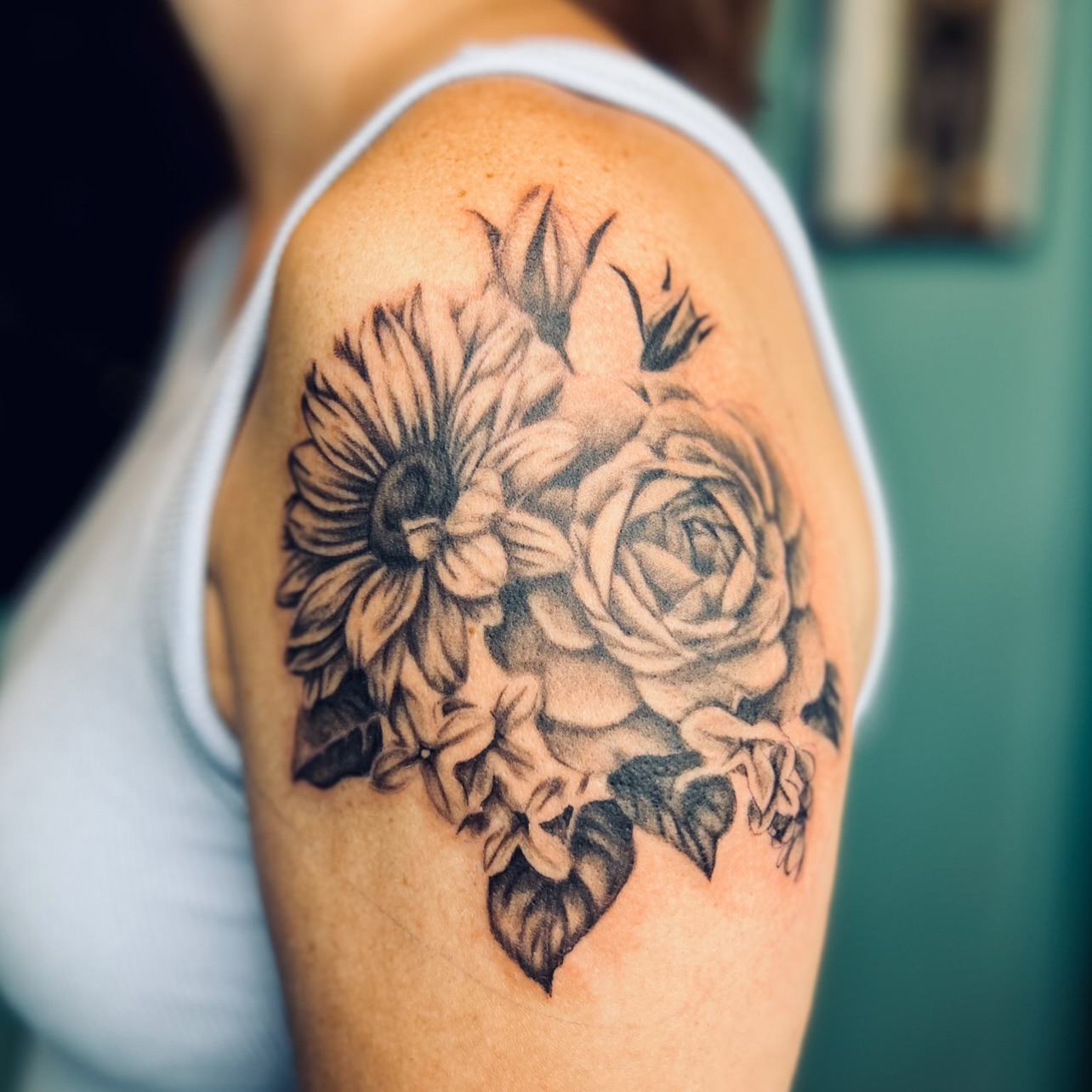 Sunflower and rose realism tattoo on the shoulder by Sydney Rose
