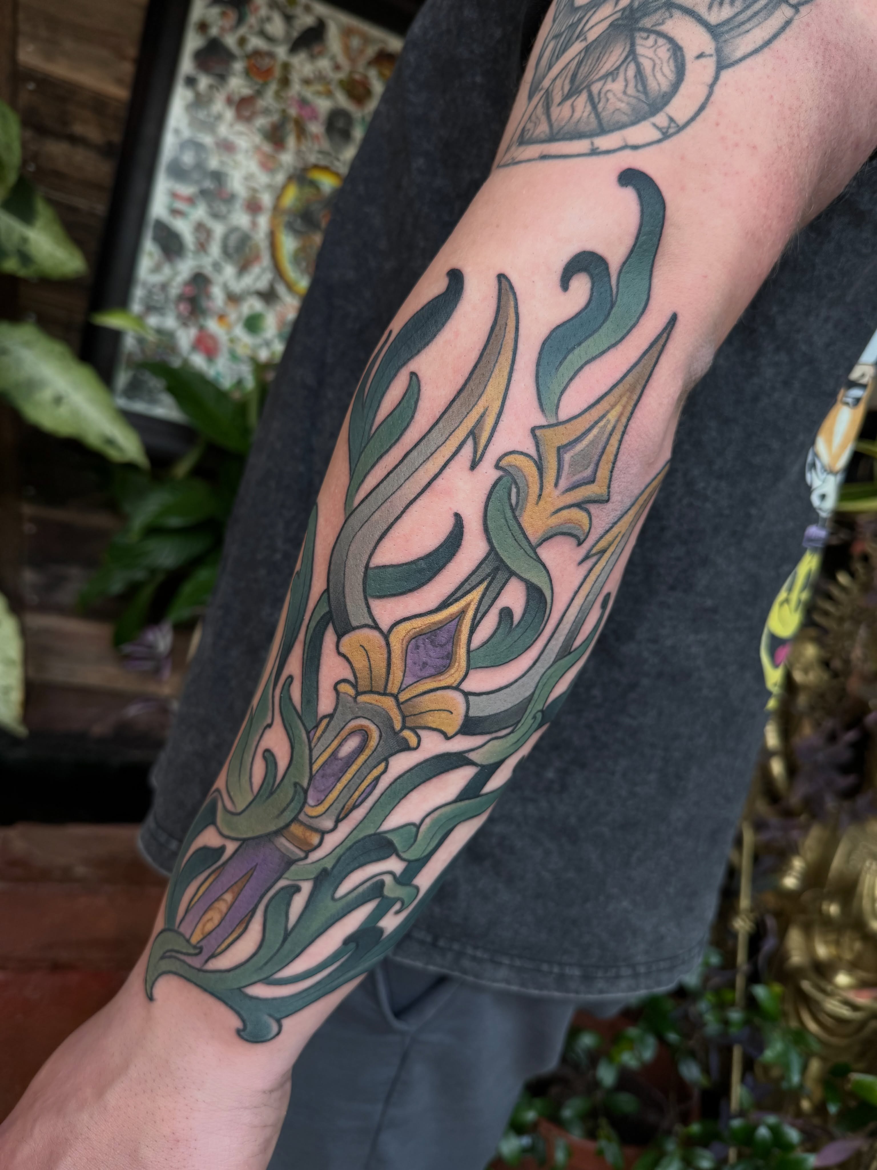 Floral design ornamental tattoo on the forearm by Freddie Brown, Lombard, IL
